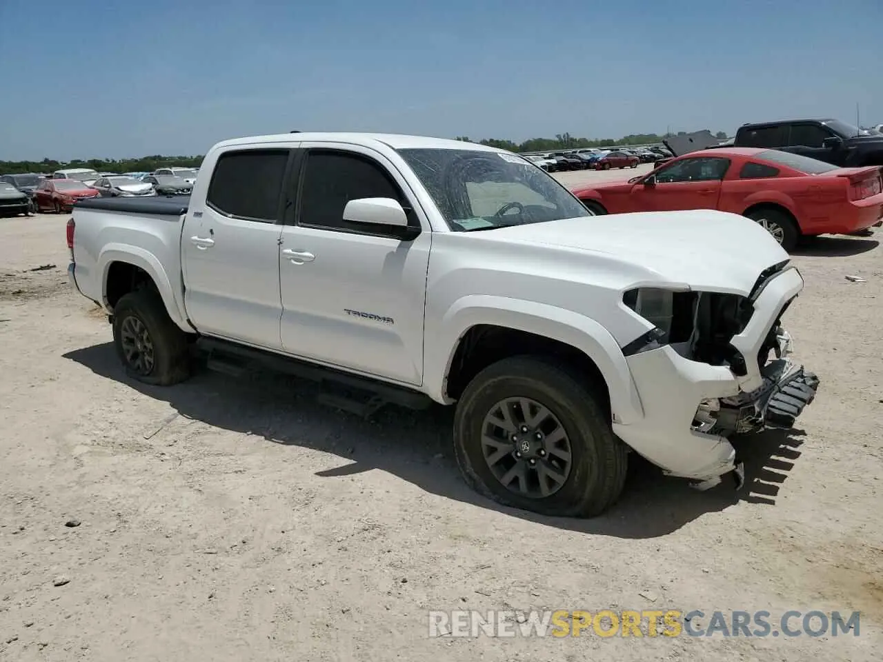 4 Photograph of a damaged car 3TMAZ5CN7PM201884 TOYOTA TACOMA 2023