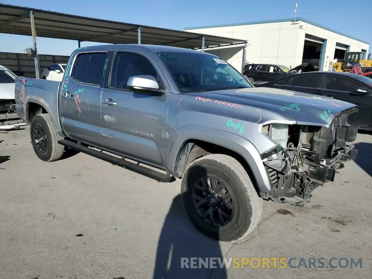 4 Photograph of a damaged car 3TMAZ5CN7PM205708 TOYOTA TACOMA 2023