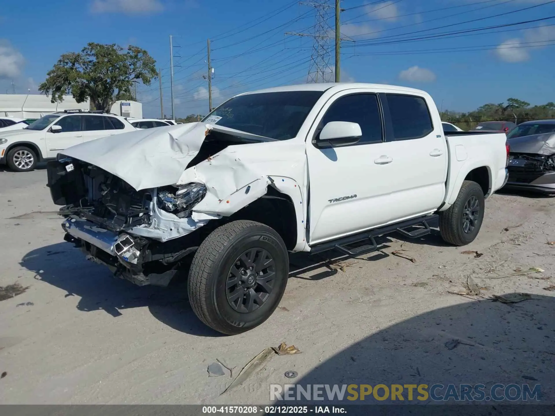 2 Photograph of a damaged car 3TMAZ5CN8PM217687 TOYOTA TACOMA 2023