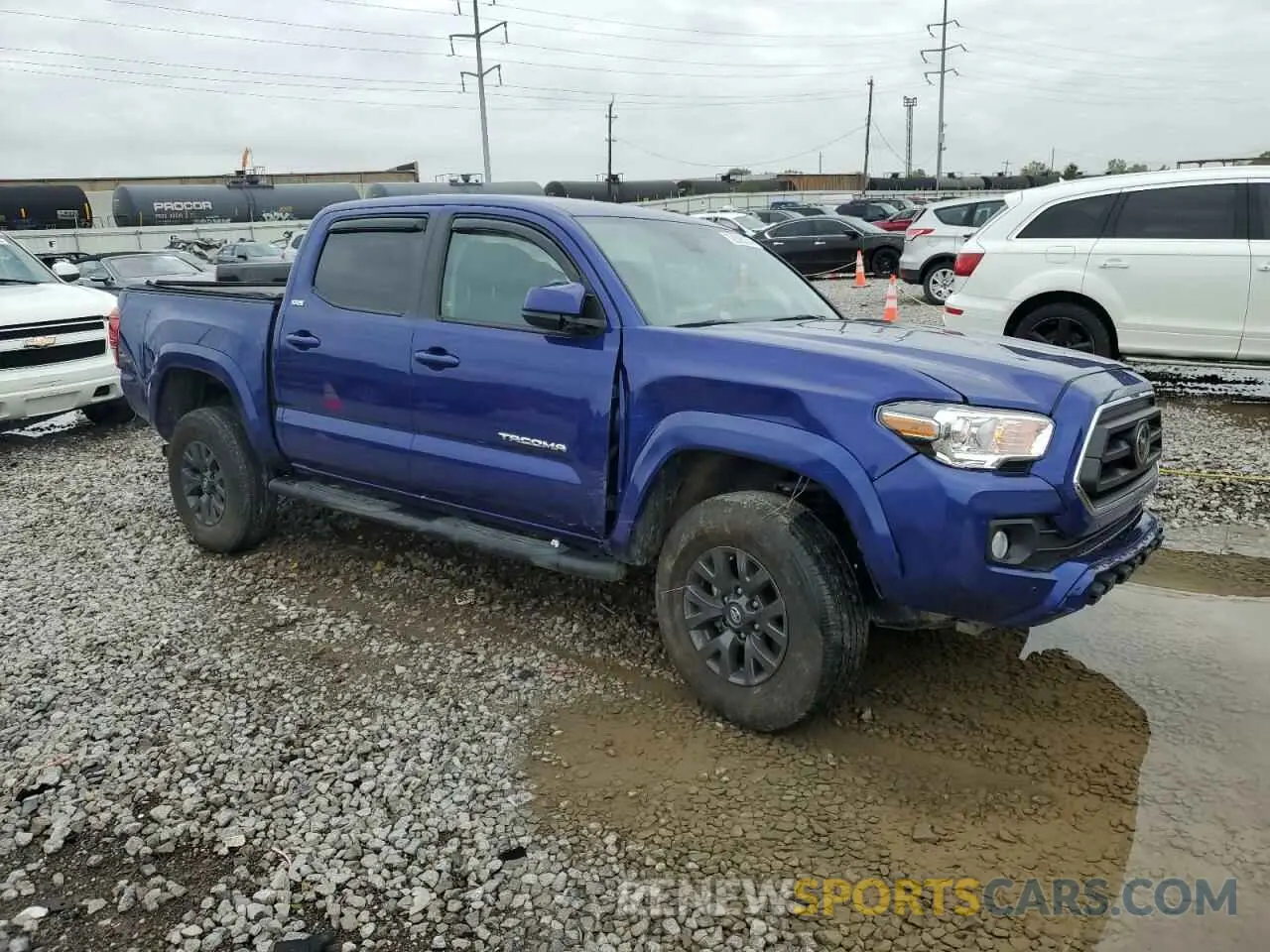 4 Photograph of a damaged car 3TMAZ5CN9PM203507 TOYOTA TACOMA 2023