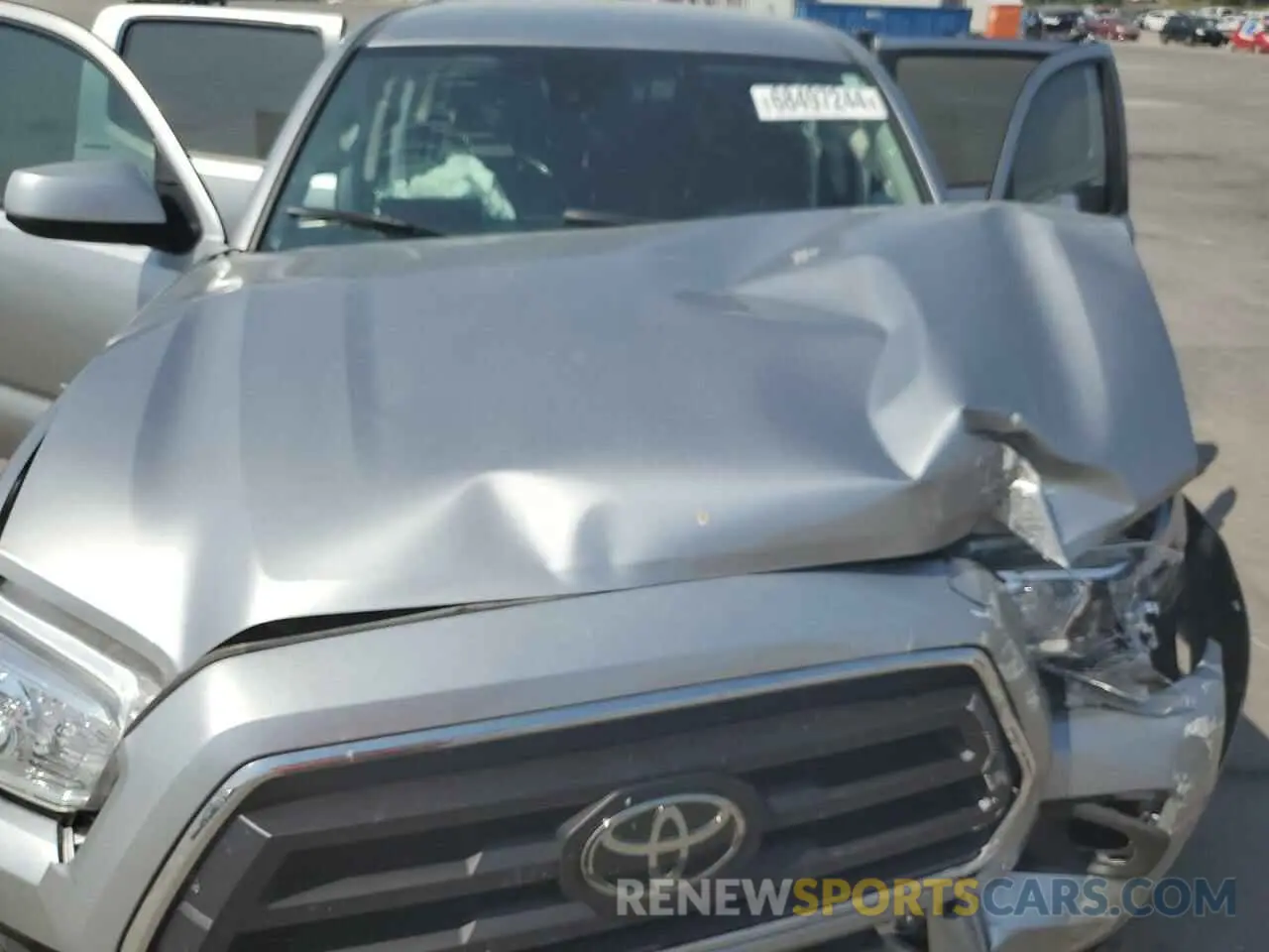 11 Photograph of a damaged car 3TMBZ5DN3PM040131 TOYOTA TACOMA 2023