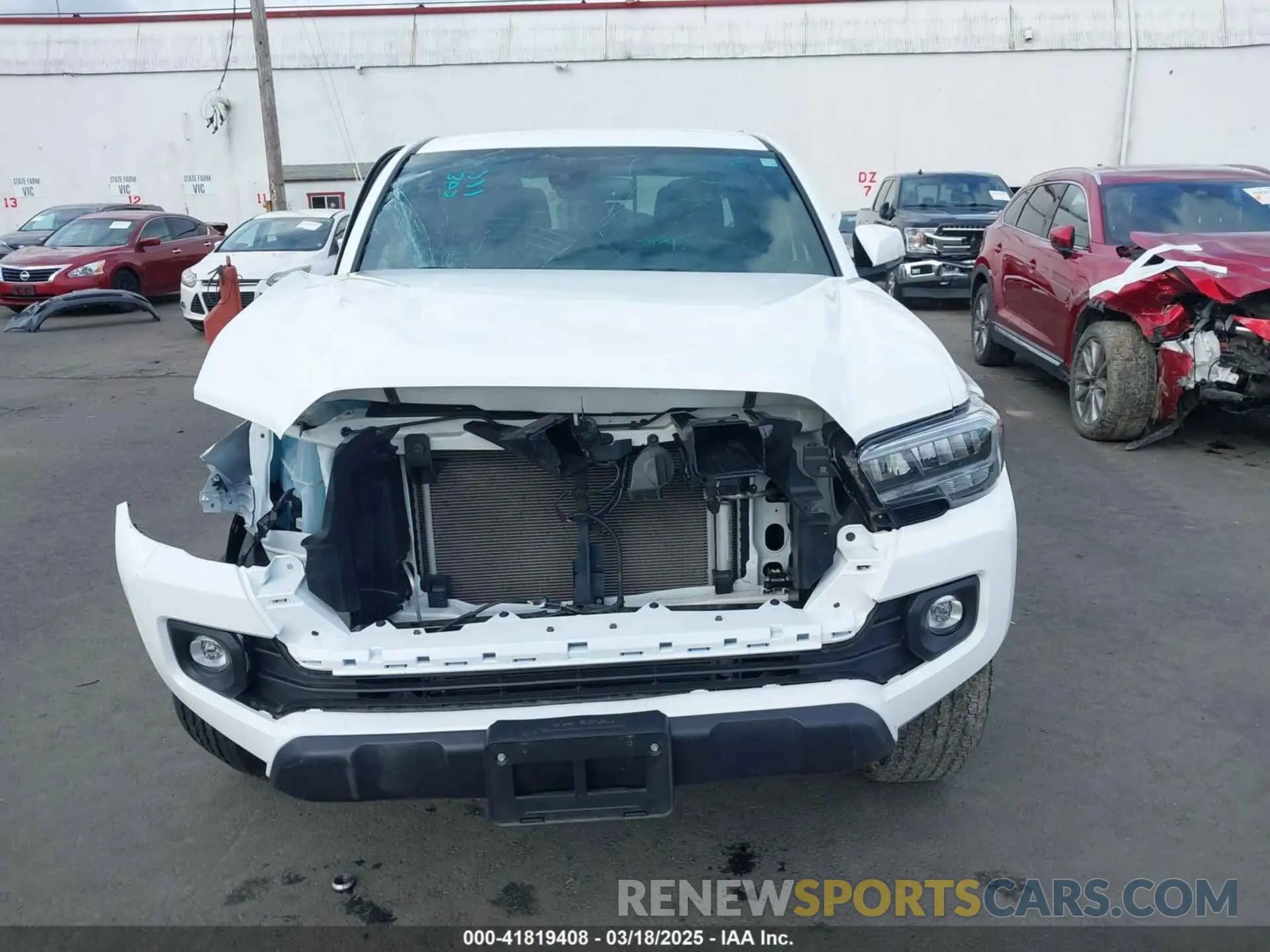 12 Photograph of a damaged car 3TMCZ5AN0PM541700 TOYOTA TACOMA 2023