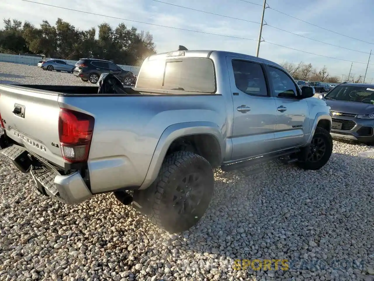 3 Photograph of a damaged car 3TMCZ5AN0PM638007 TOYOTA TACOMA 2023