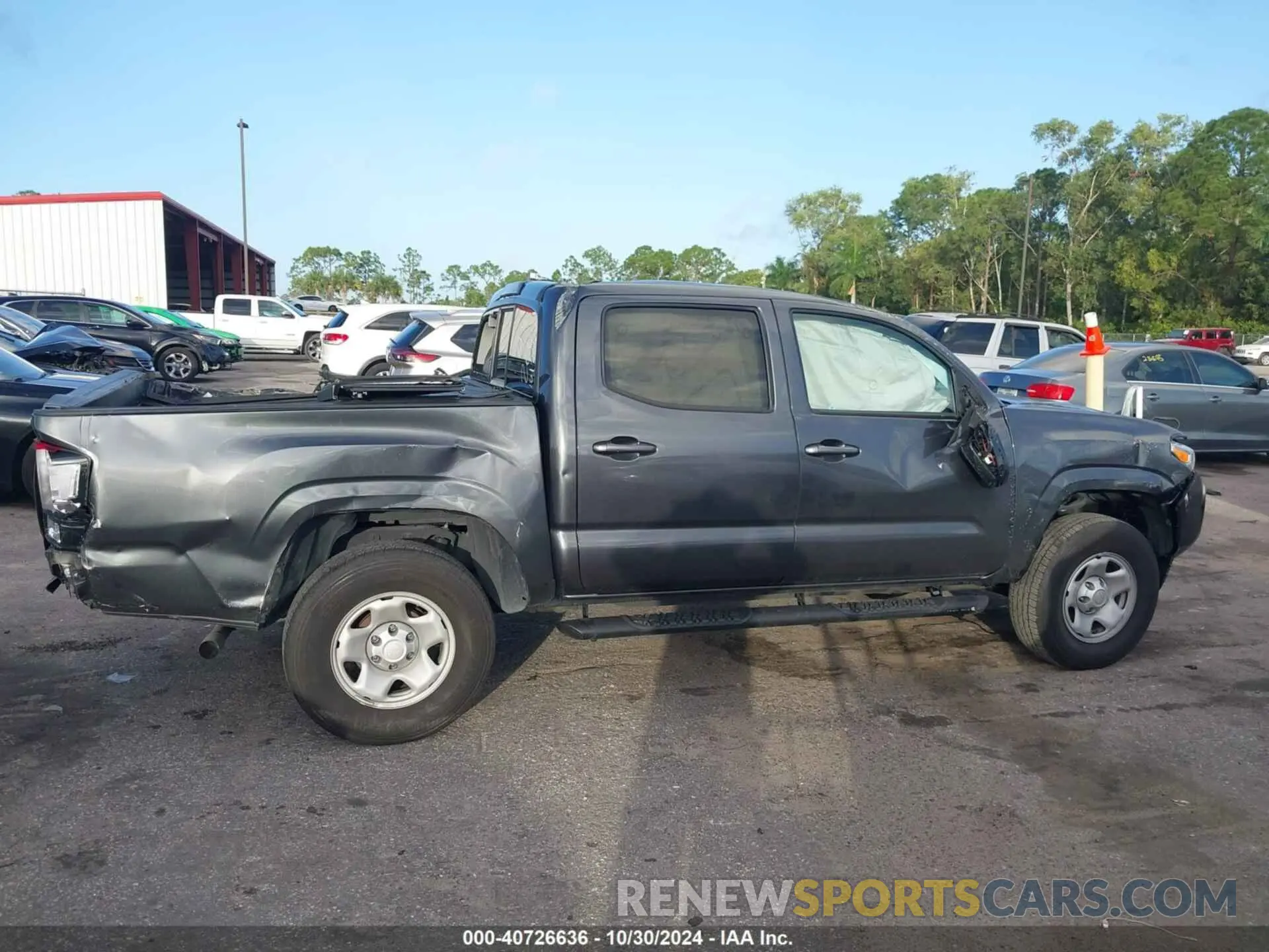 14 Photograph of a damaged car 3TMCZ5AN1PM542662 TOYOTA TACOMA 2023