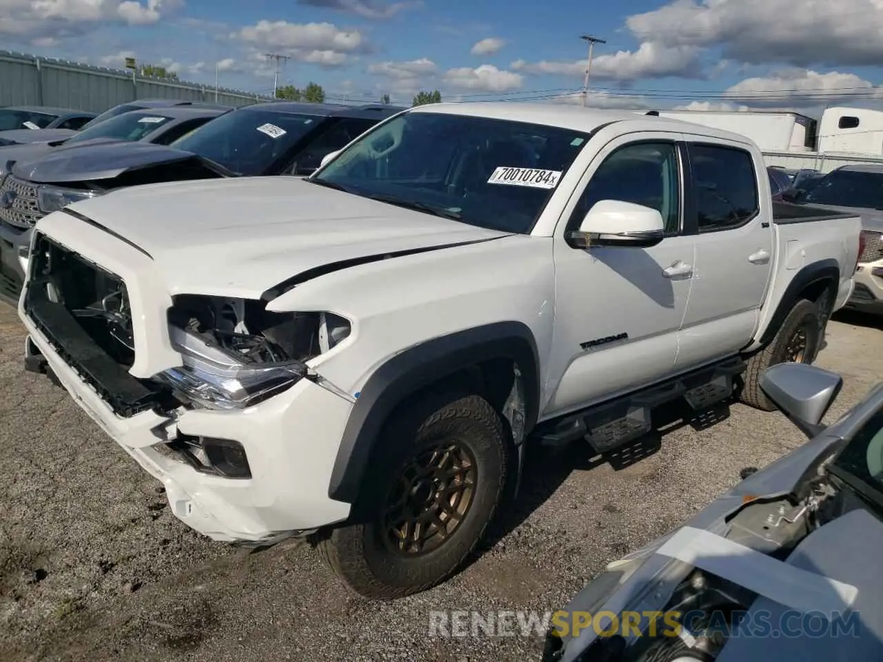 1 Photograph of a damaged car 3TMCZ5AN1PM548221 TOYOTA TACOMA 2023