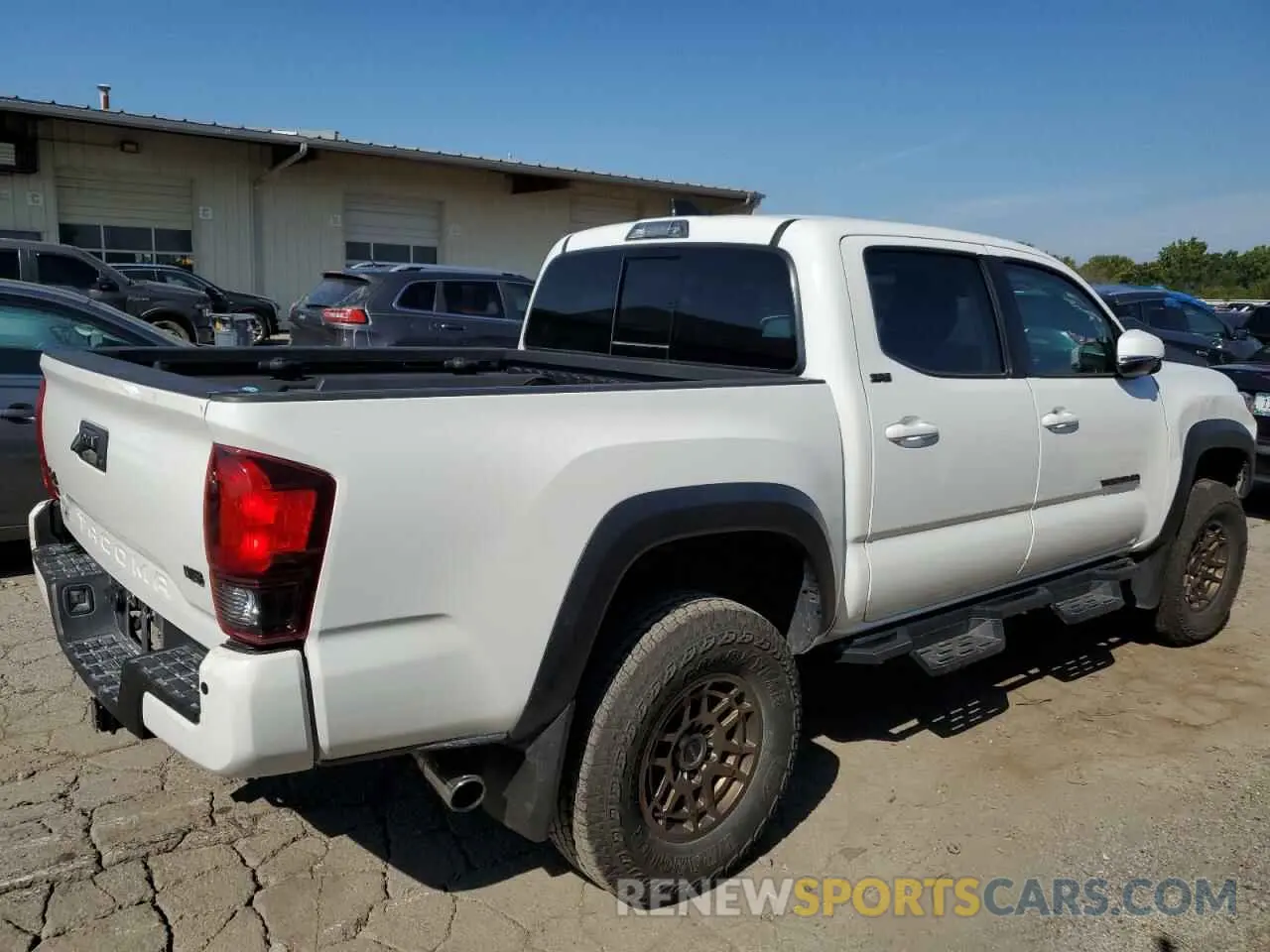 3 Photograph of a damaged car 3TMCZ5AN1PM548221 TOYOTA TACOMA 2023