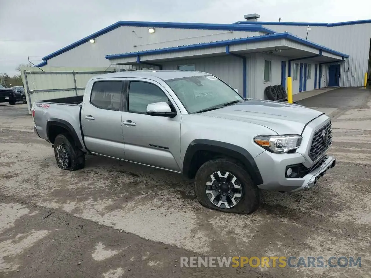 4 Photograph of a damaged car 3TMCZ5AN1PM558117 TOYOTA TACOMA 2023