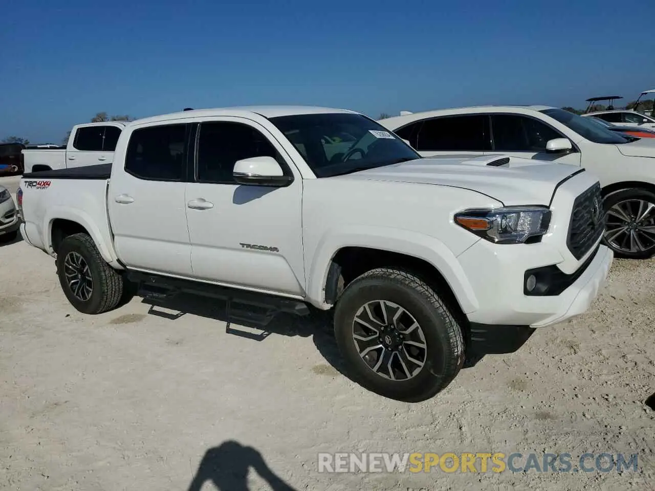 4 Photograph of a damaged car 3TMCZ5AN1PM570686 TOYOTA TACOMA 2023