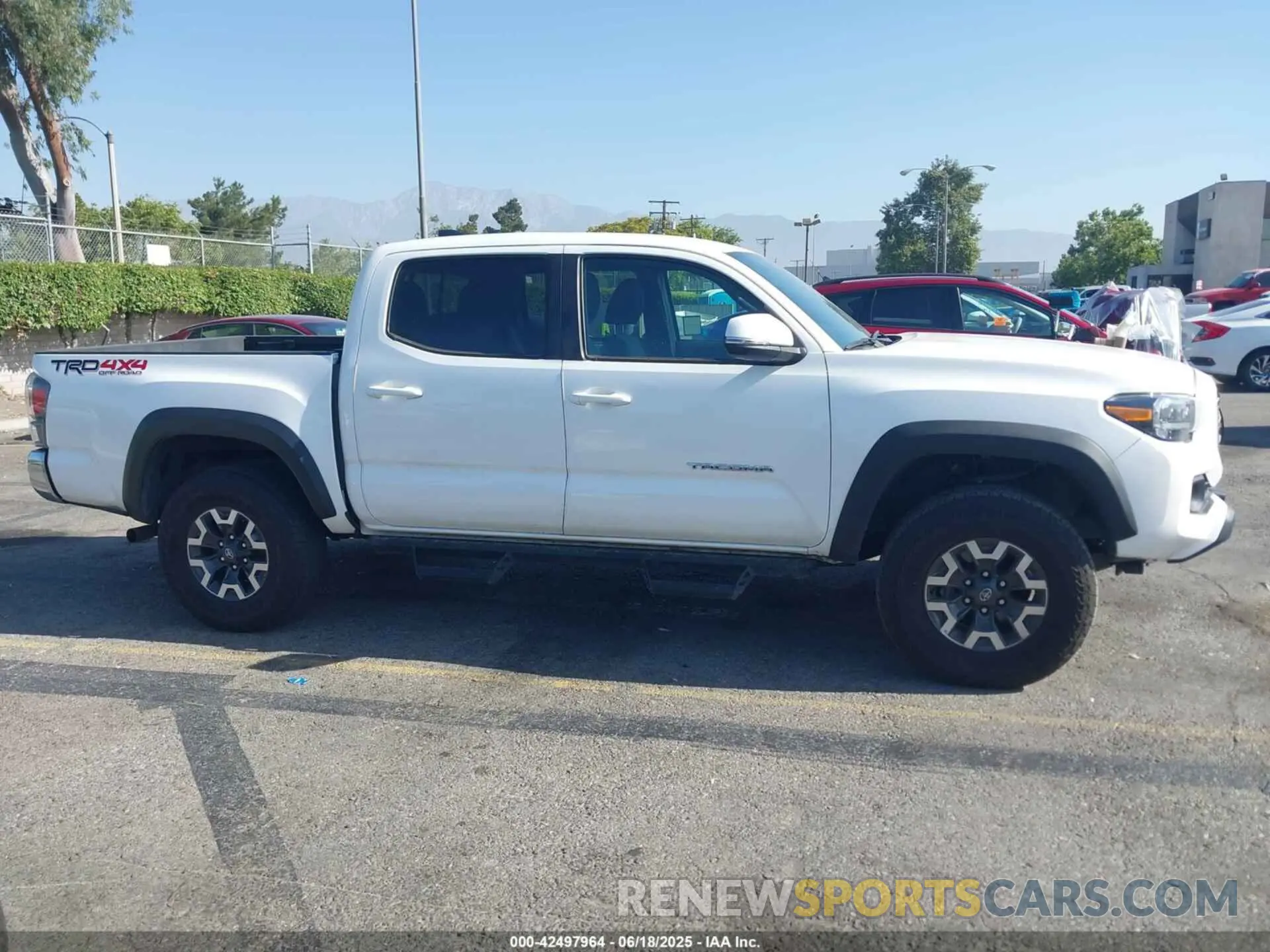13 Photograph of a damaged car 3TMCZ5AN1PM574799 TOYOTA TACOMA 2023