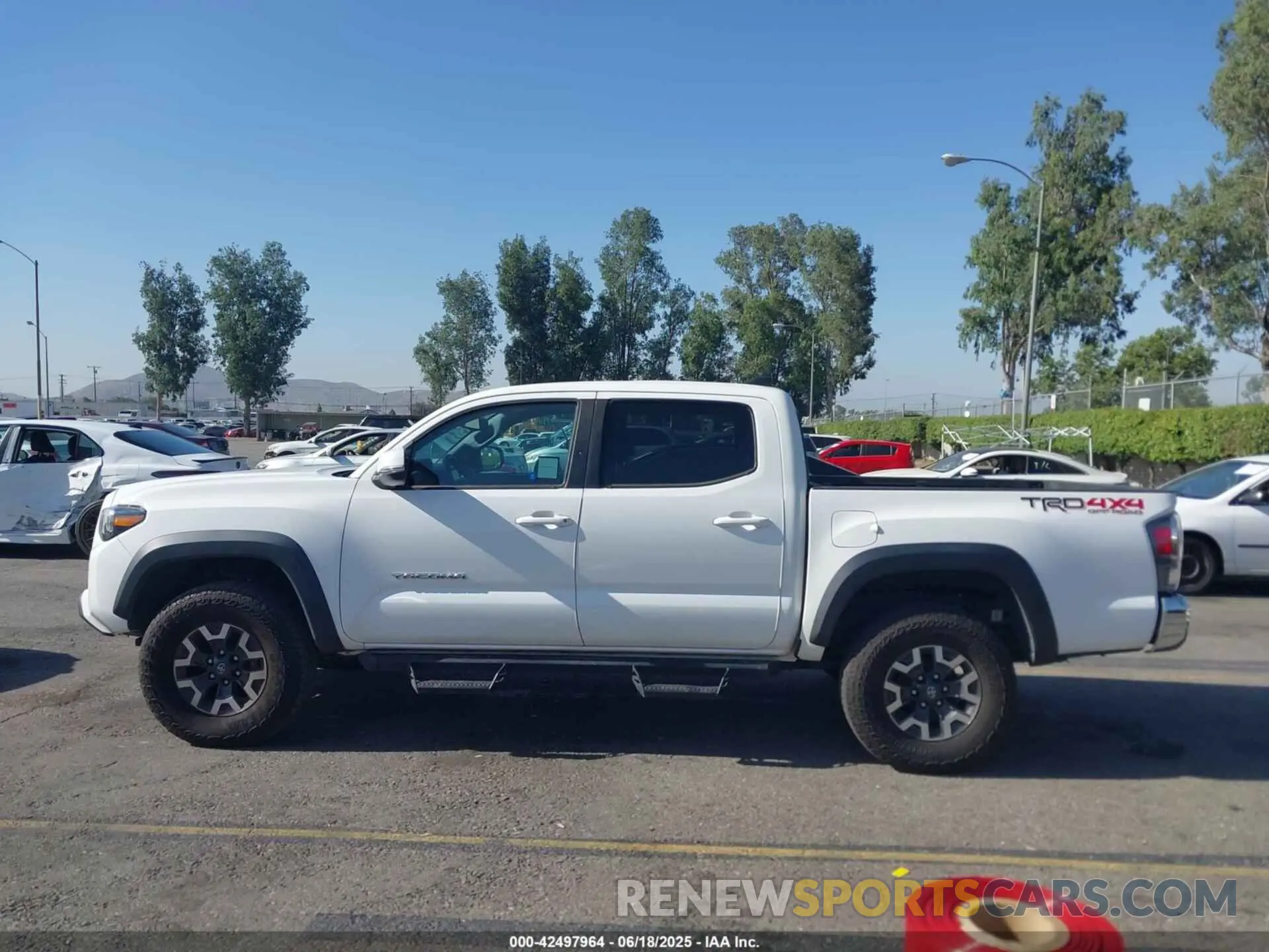 14 Photograph of a damaged car 3TMCZ5AN1PM574799 TOYOTA TACOMA 2023