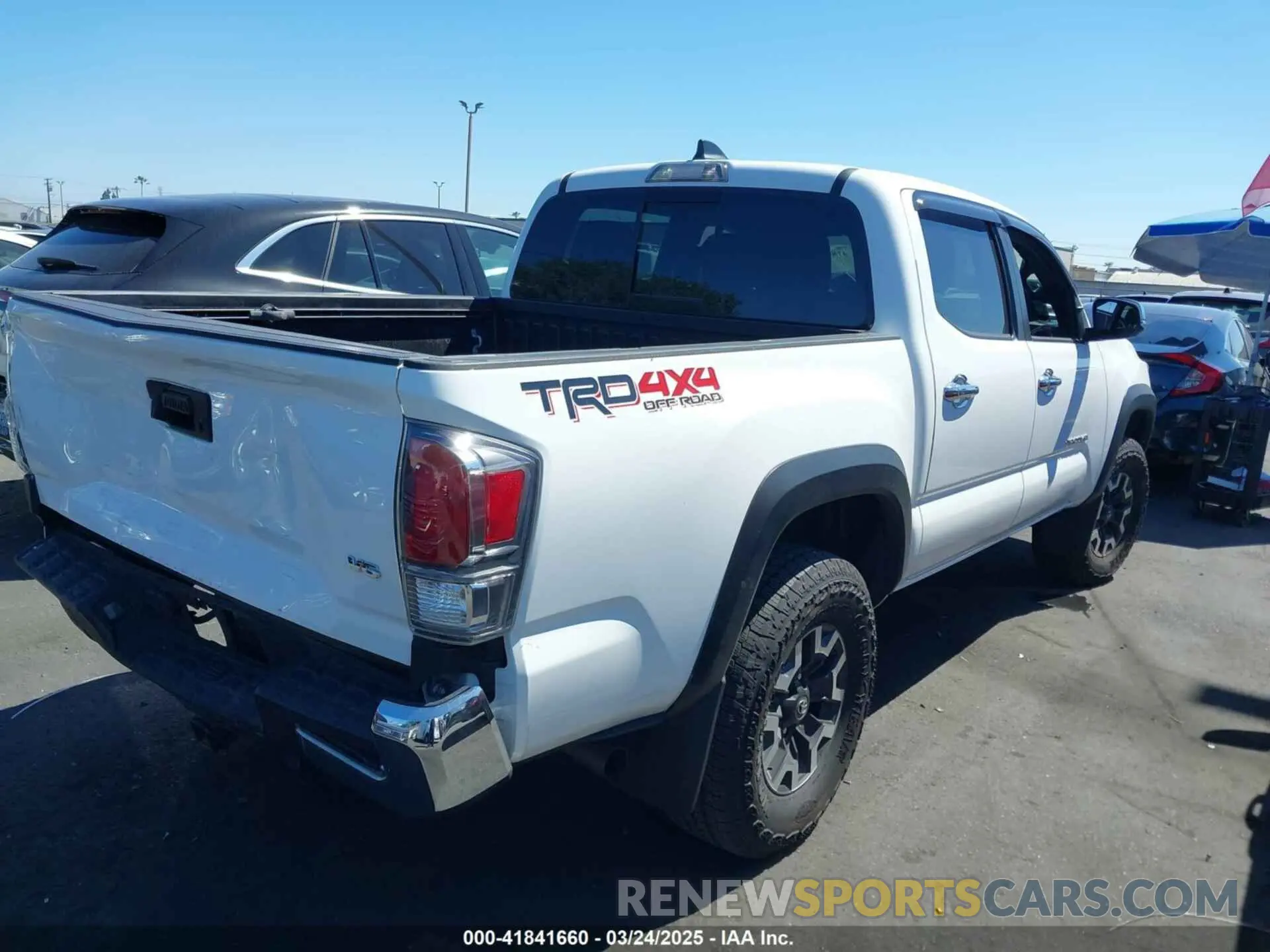 4 Photograph of a damaged car 3TMCZ5AN1PM577153 TOYOTA TACOMA 2023