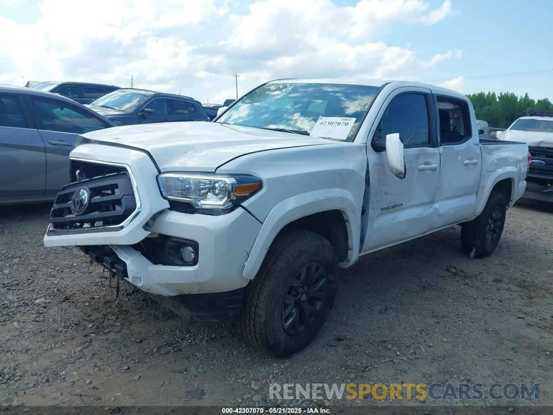 2 Photograph of a damaged car 3TMCZ5AN1PM580022 TOYOTA TACOMA 2023