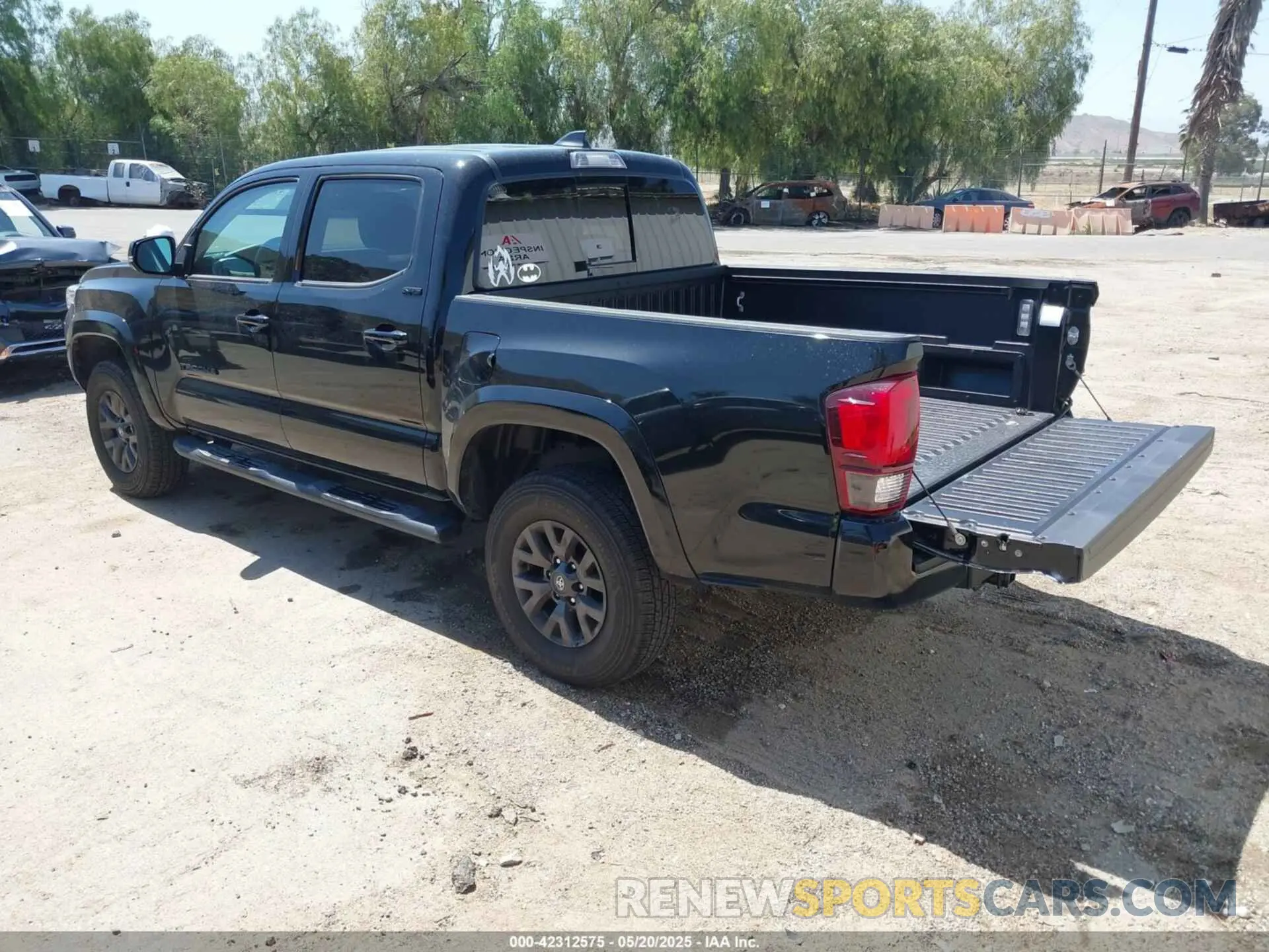 3 Photograph of a damaged car 3TMCZ5AN1PM654572 TOYOTA TACOMA 2023