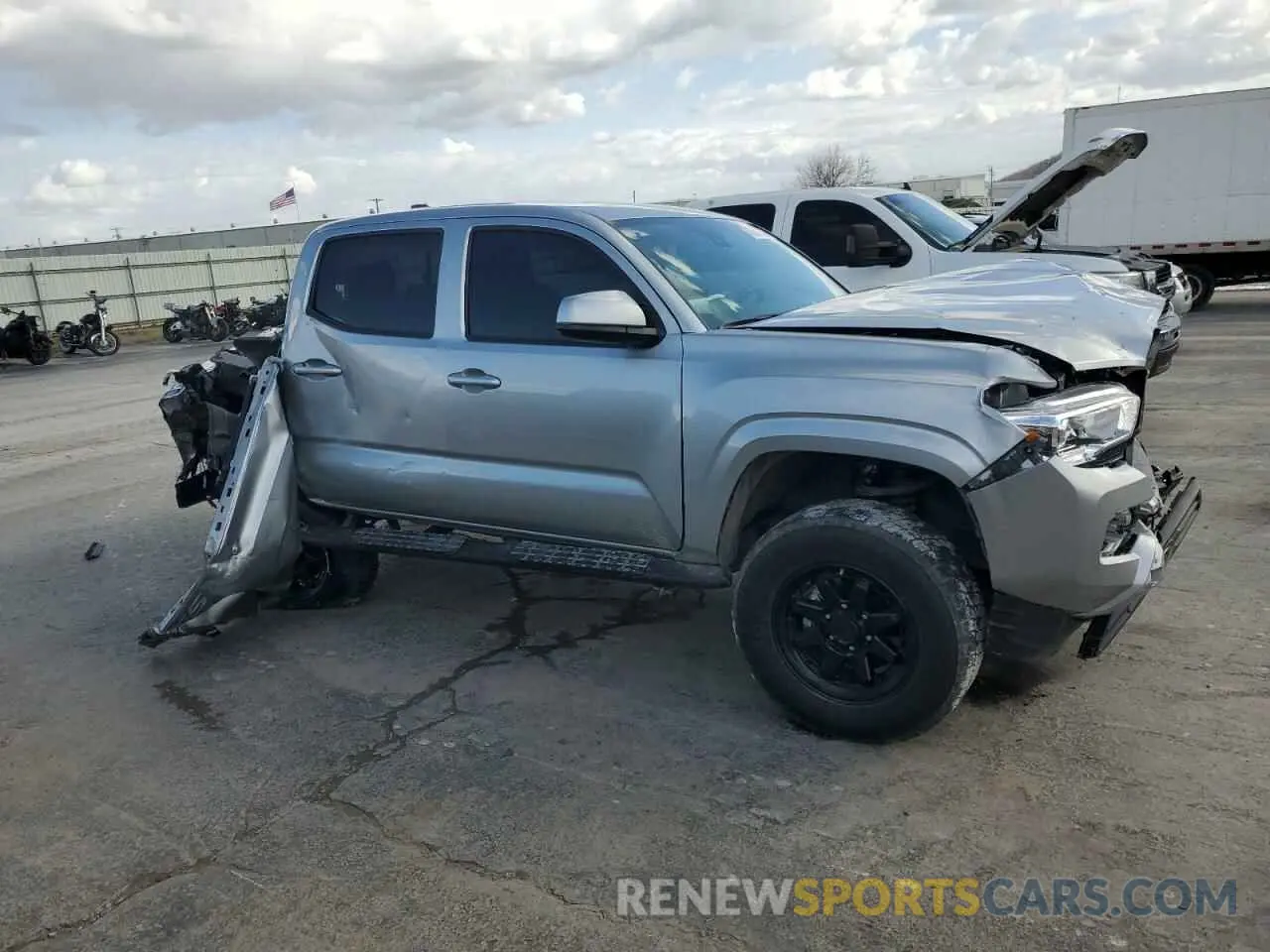 4 Photograph of a damaged car 3TMCZ5AN2PM543254 TOYOTA TACOMA 2023
