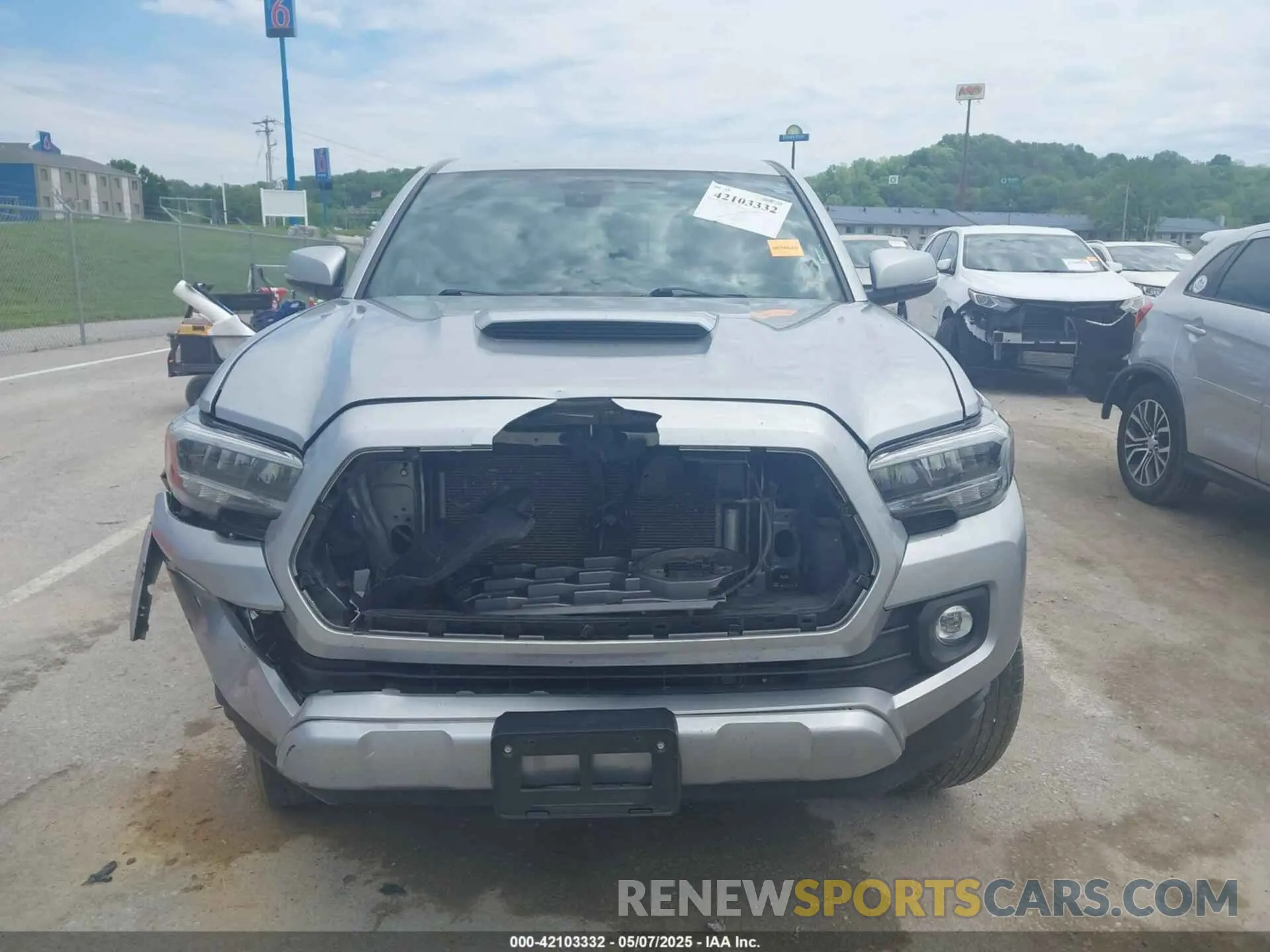 12 Photograph of a damaged car 3TMCZ5AN2PM553895 TOYOTA TACOMA 2023