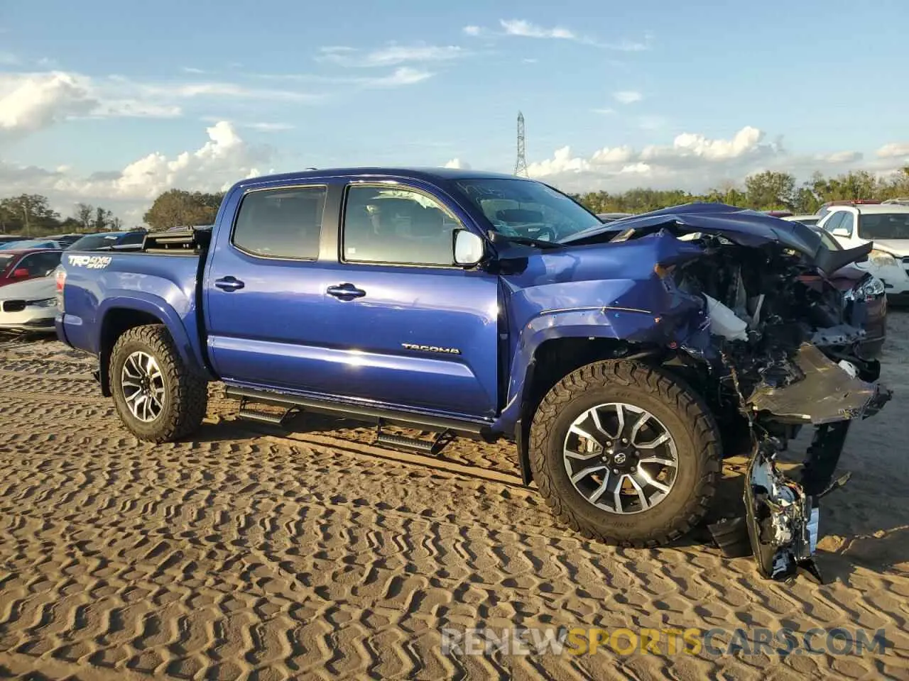 4 Photograph of a damaged car 3TMCZ5AN2PM639501 TOYOTA TACOMA 2023