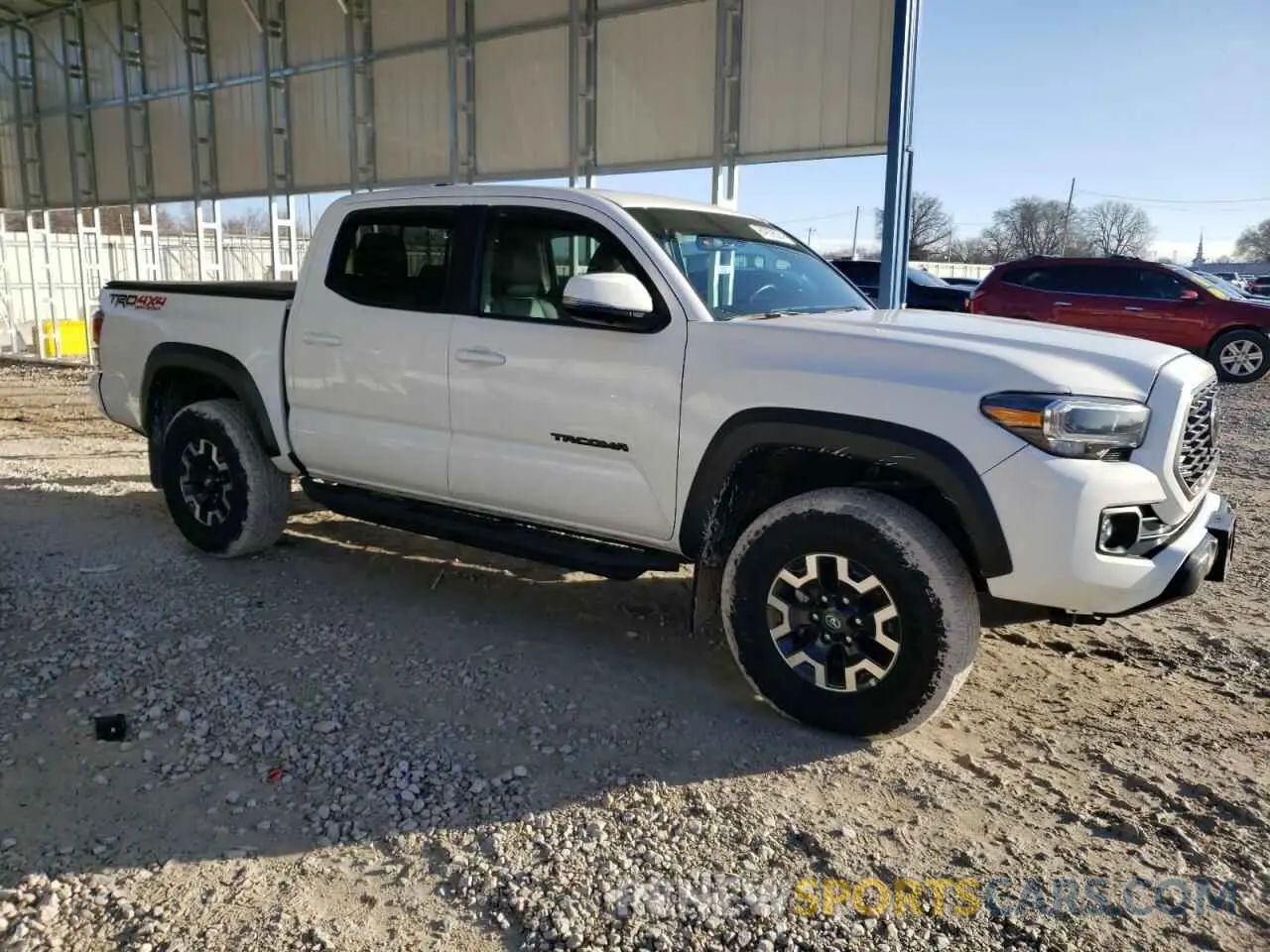 4 Photograph of a damaged car 3TMCZ5AN3PM613604 TOYOTA TACOMA 2023