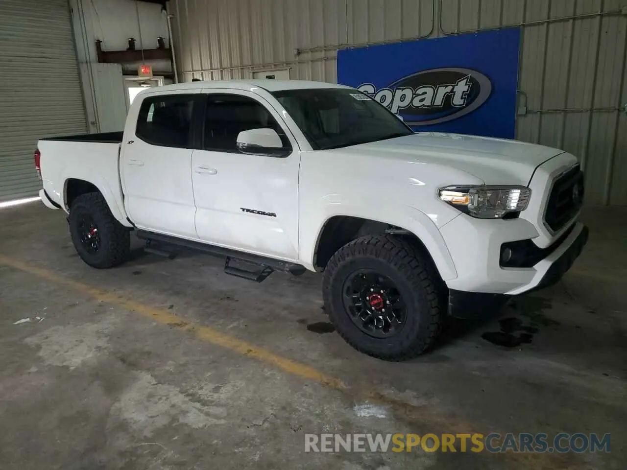 4 Photograph of a damaged car 3TMCZ5AN3PM654492 TOYOTA TACOMA 2023