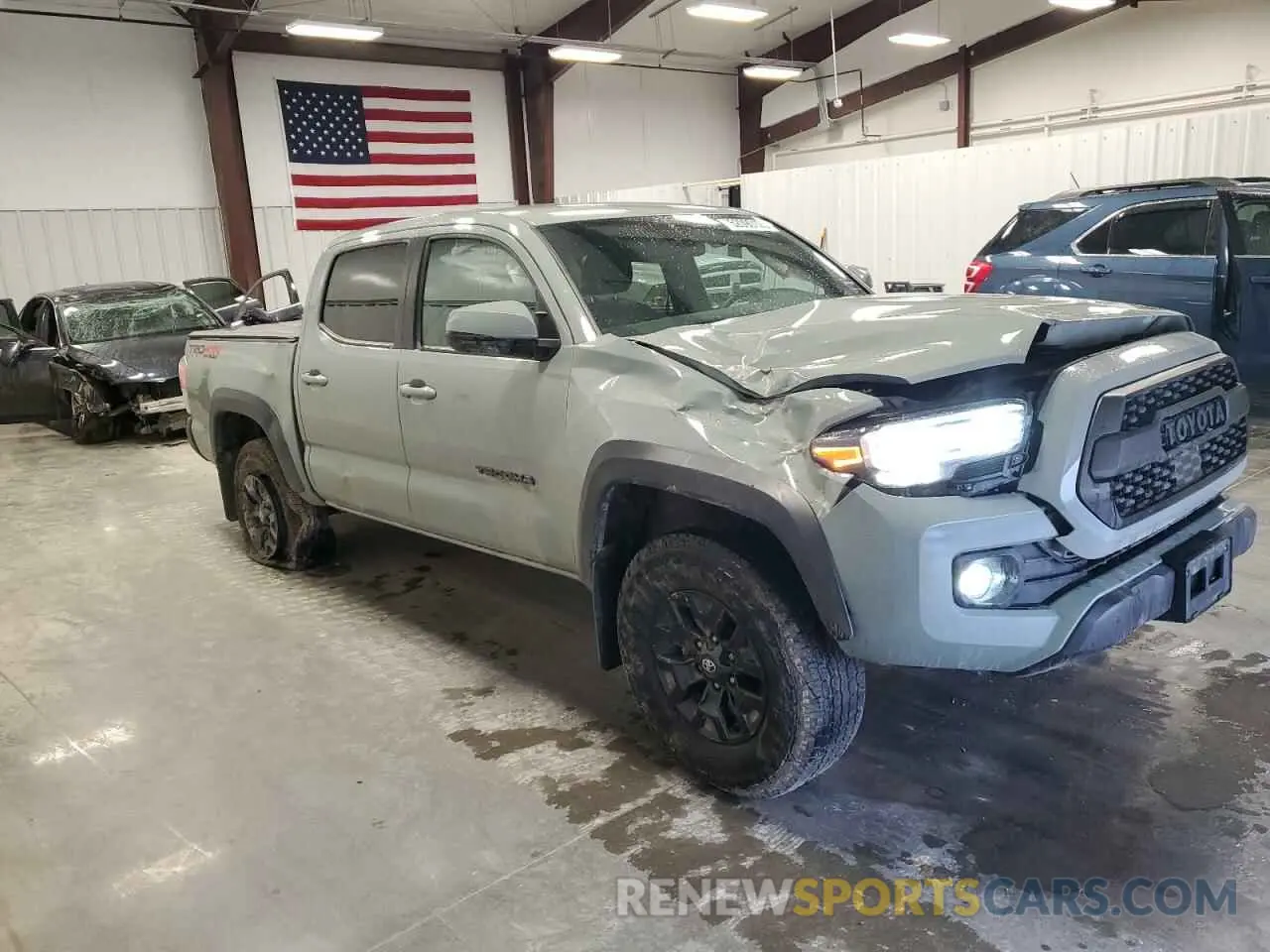 4 Photograph of a damaged car 3TMCZ5AN4PM550576 TOYOTA TACOMA 2023