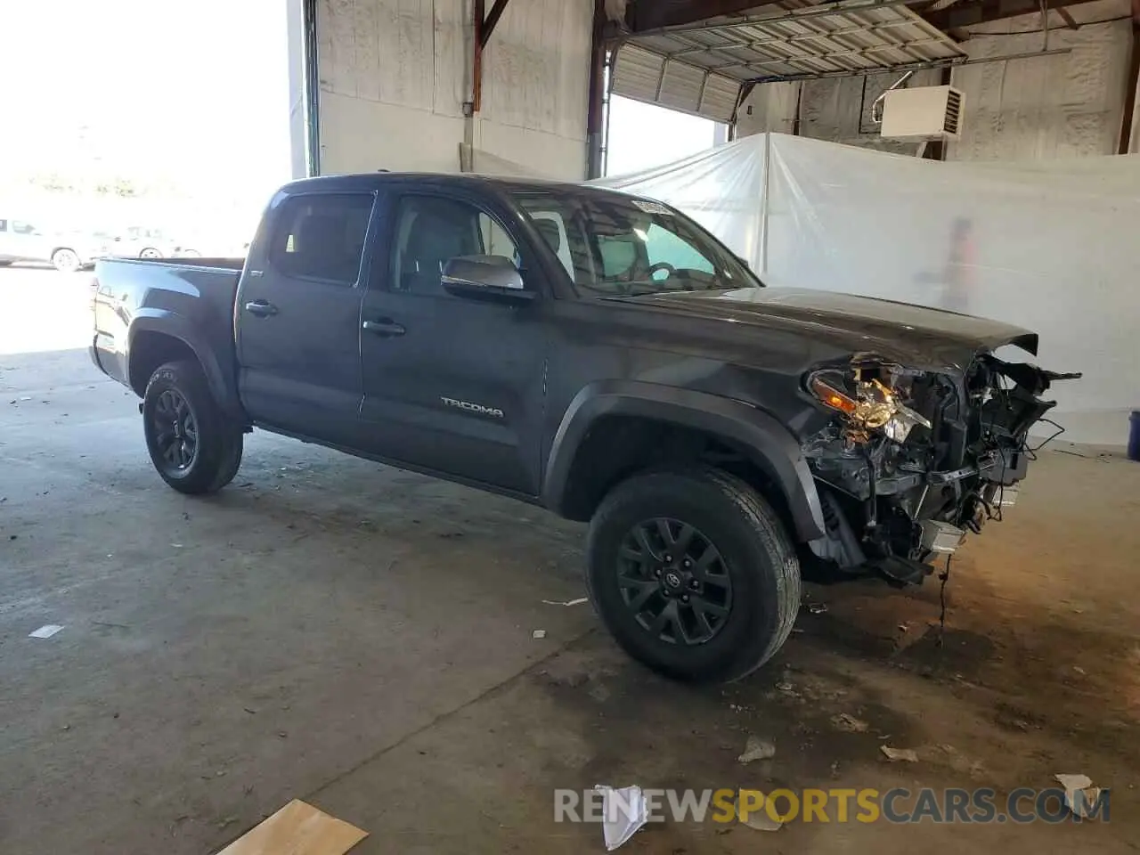 4 Photograph of a damaged car 3TMCZ5AN4PM599664 TOYOTA TACOMA 2023
