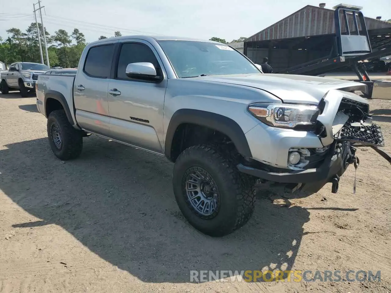 4 Photograph of a damaged car 3TMCZ5AN4PM627365 TOYOTA TACOMA 2023