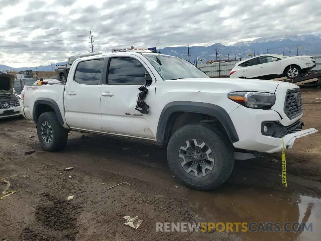 4 Photograph of a damaged car 3TMCZ5AN5PM572215 TOYOTA TACOMA 2023
