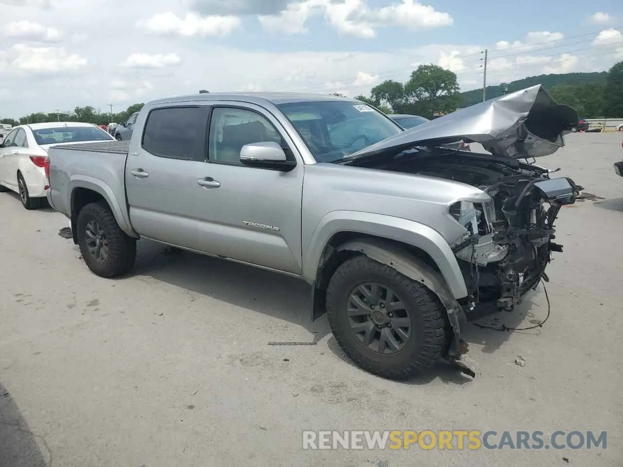 4 Photograph of a damaged car 3TMCZ5AN5PM605407 TOYOTA TACOMA 2023