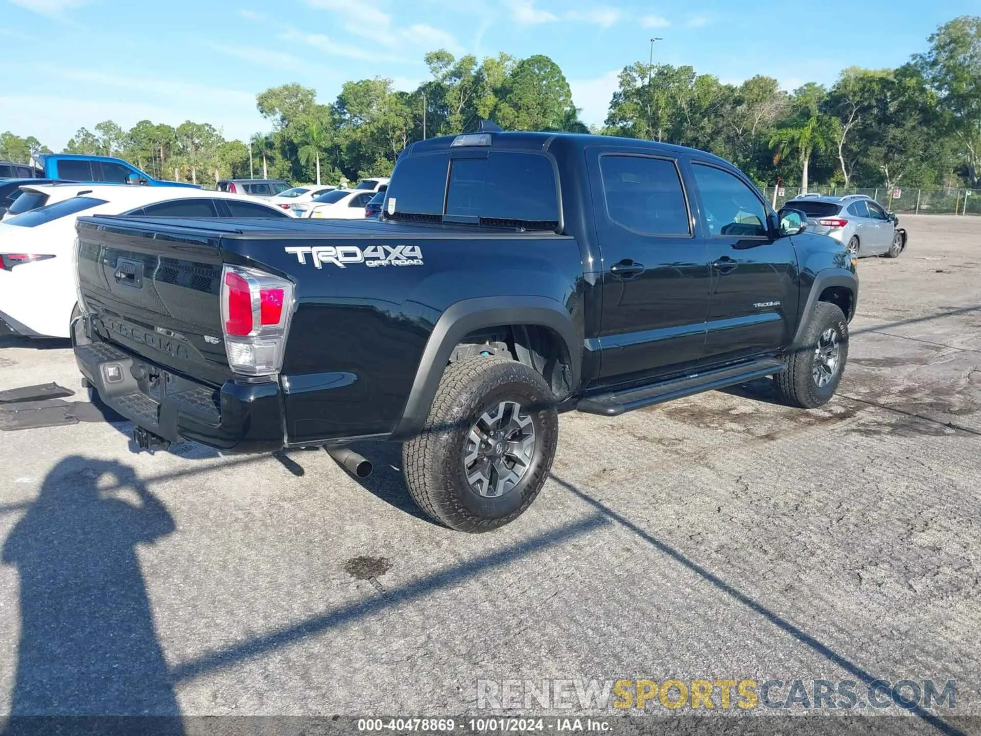 4 Photograph of a damaged car 3TMCZ5AN5PM608159 TOYOTA TACOMA 2023