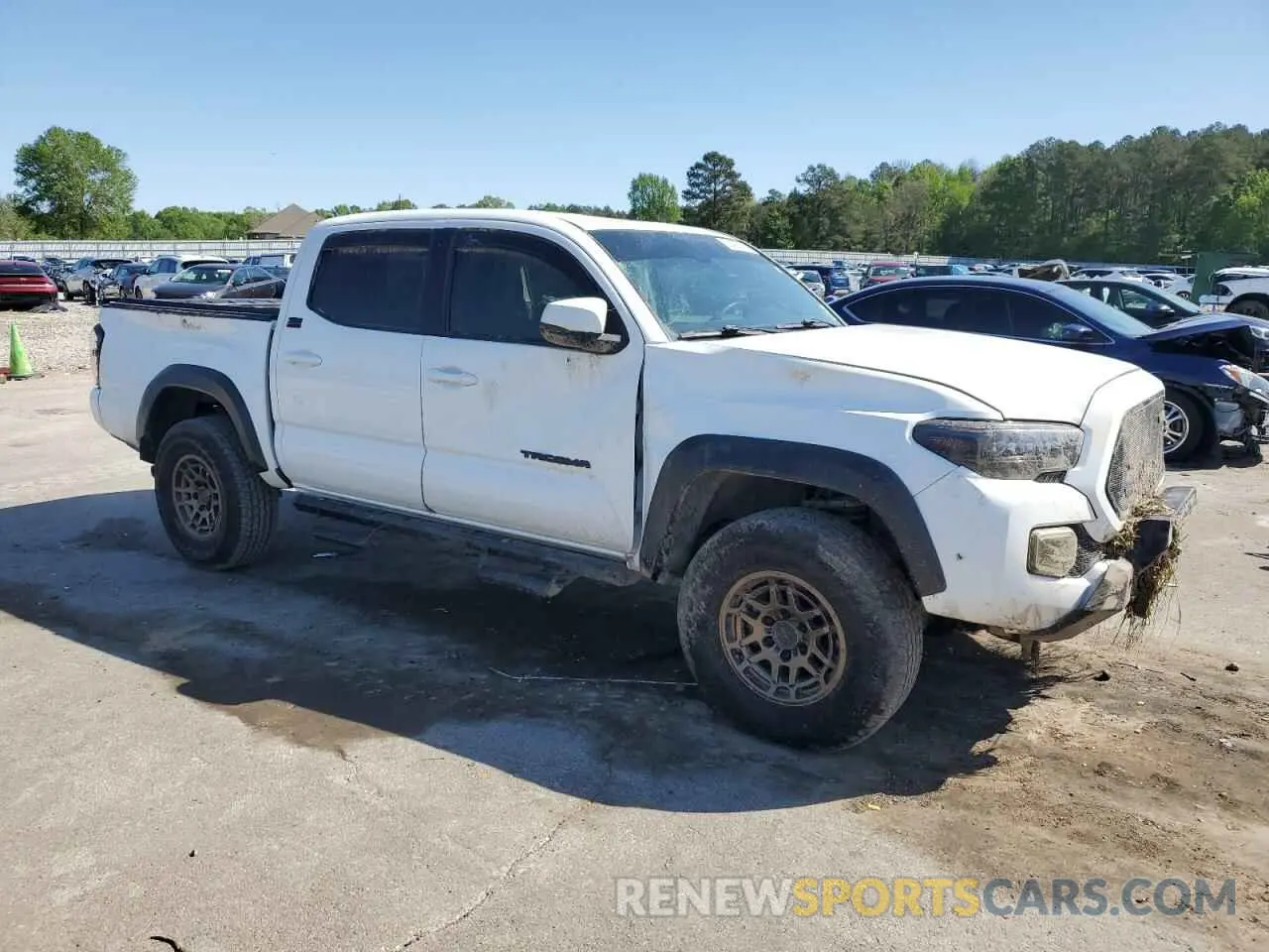 4 Photograph of a damaged car 3TMCZ5AN6PM611488 TOYOTA TACOMA 2023