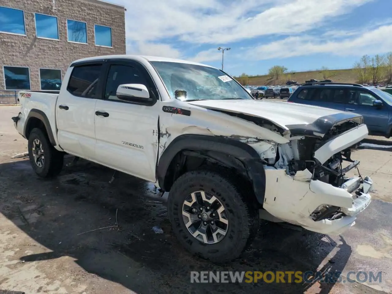 4 Photograph of a damaged car 3TMCZ5AN7PM549244 TOYOTA TACOMA 2023