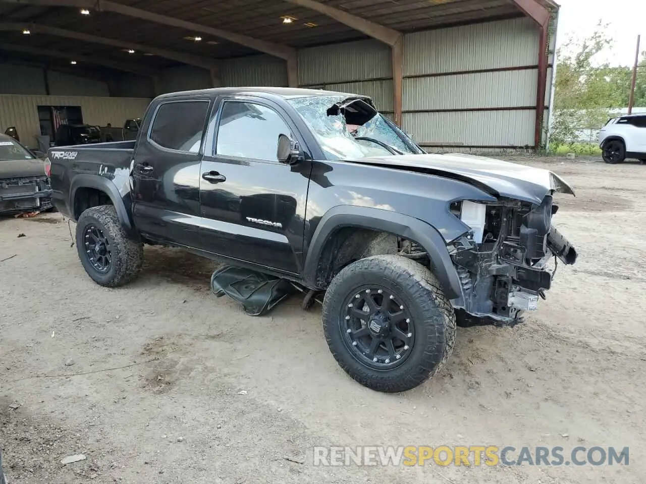 4 Photograph of a damaged car 3TMCZ5AN7PM568103 TOYOTA TACOMA 2023