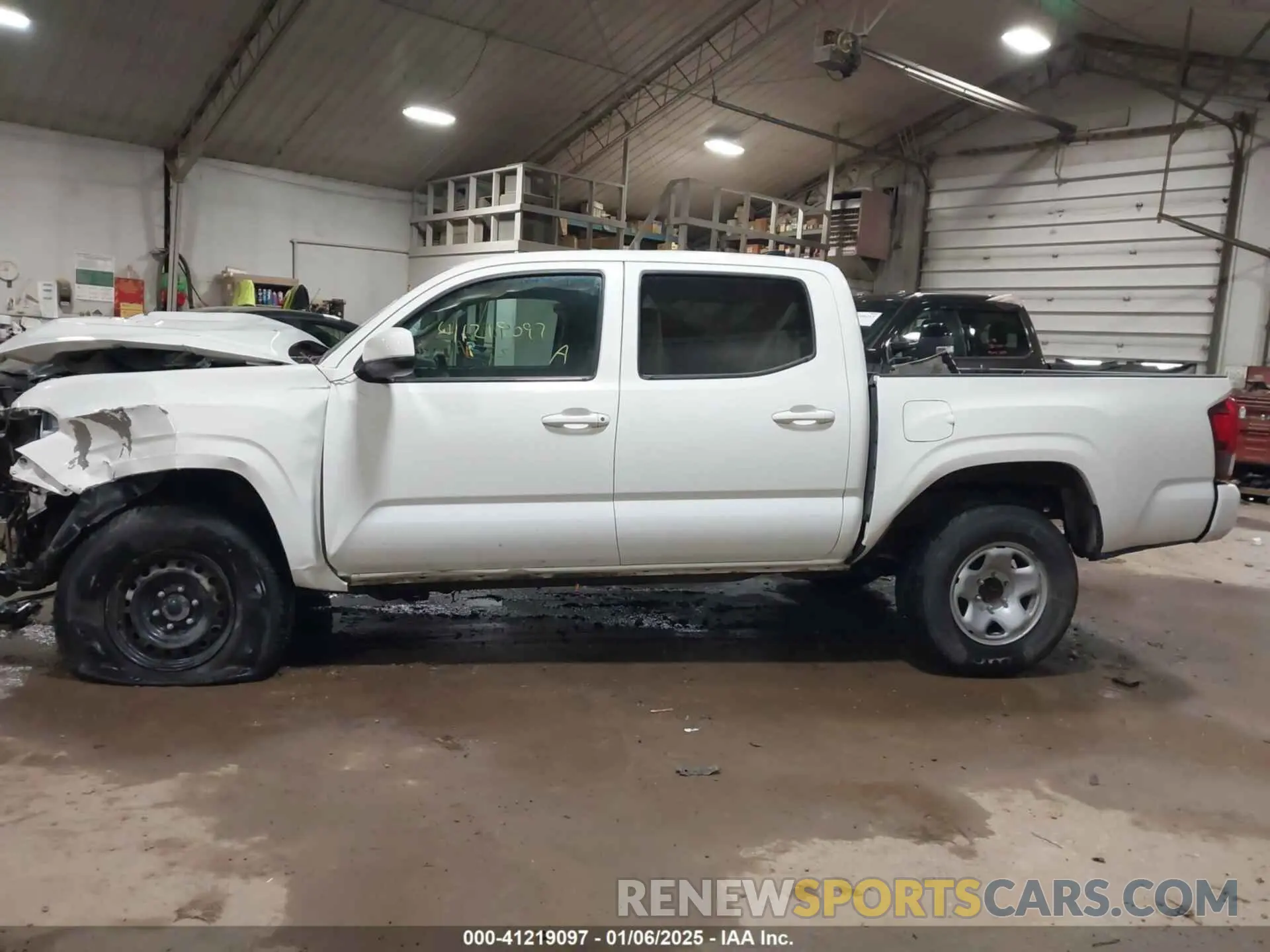 14 Photograph of a damaged car 3TMCZ5AN7PM571924 TOYOTA TACOMA 2023