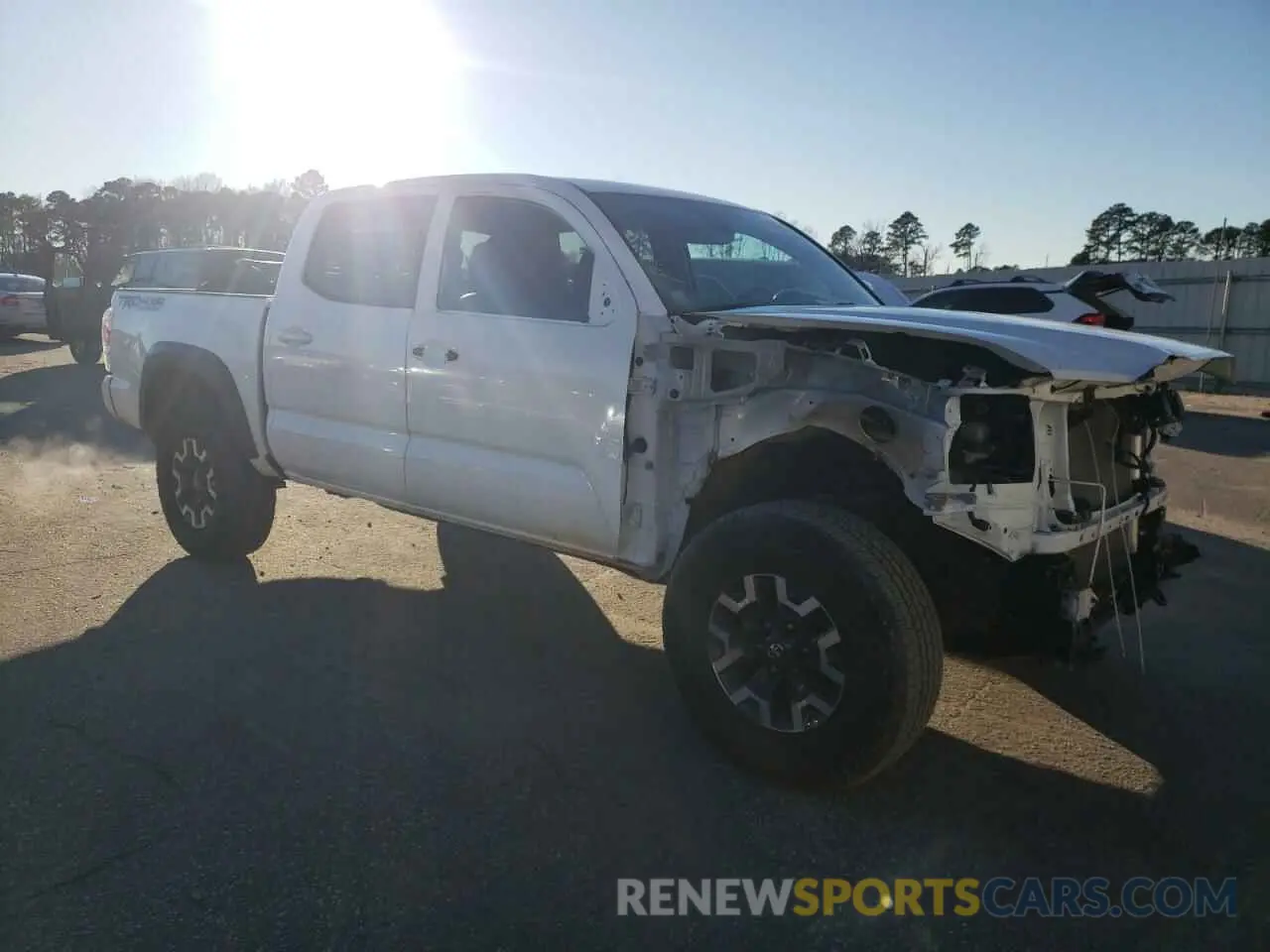 4 Photograph of a damaged car 3TMCZ5AN7PM575228 TOYOTA TACOMA 2023