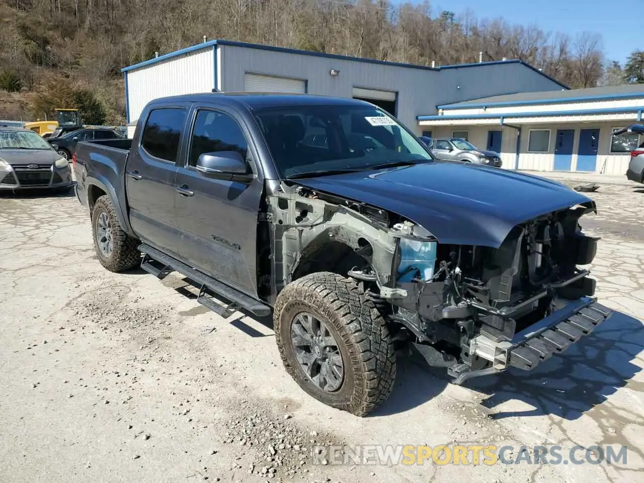 4 Photograph of a damaged car 3TMCZ5AN7PM628719 TOYOTA TACOMA 2023