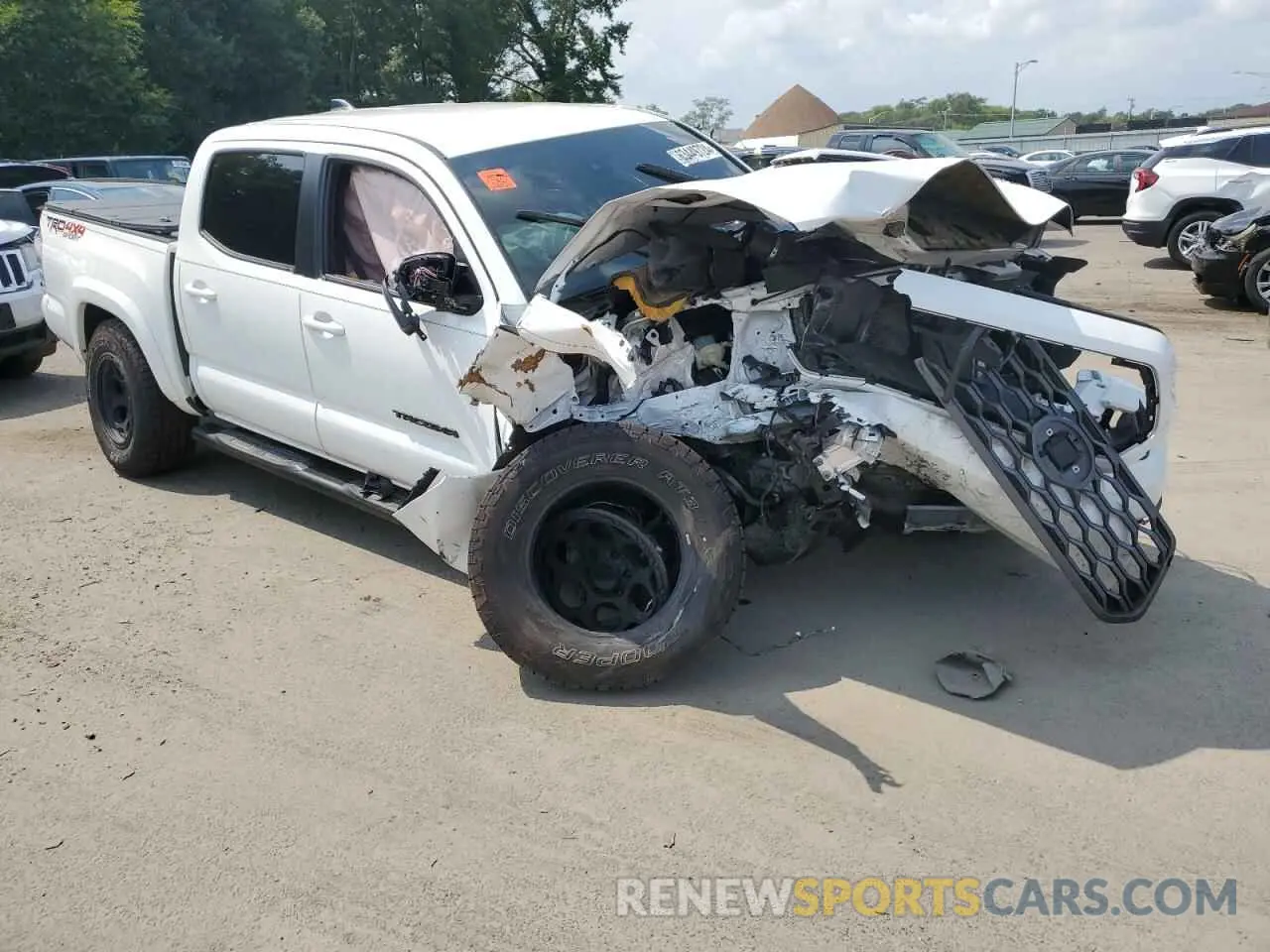 4 Photograph of a damaged car 3TMCZ5AN7PM643818 TOYOTA TACOMA 2023