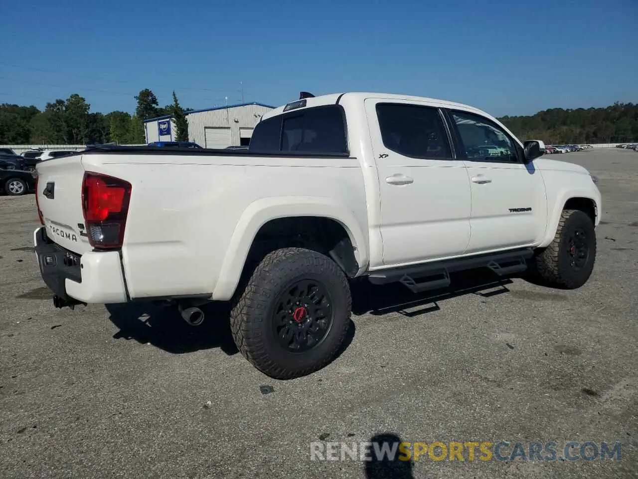 3 Photograph of a damaged car 3TMCZ5AN8PM591177 TOYOTA TACOMA 2023