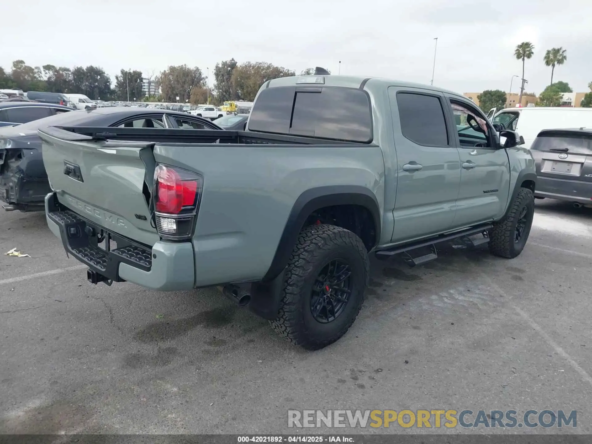 4 Photograph of a damaged car 3TMCZ5AN8PM630141 TOYOTA TACOMA 2023