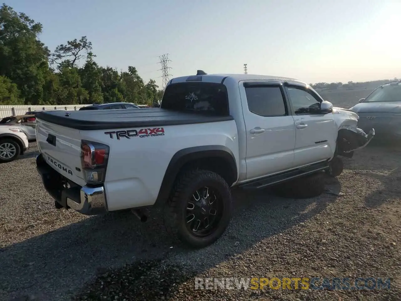 3 Photograph of a damaged car 3TMCZ5AN9PM542523 TOYOTA TACOMA 2023