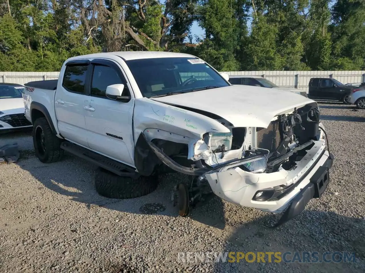 4 Photograph of a damaged car 3TMCZ5AN9PM542523 TOYOTA TACOMA 2023