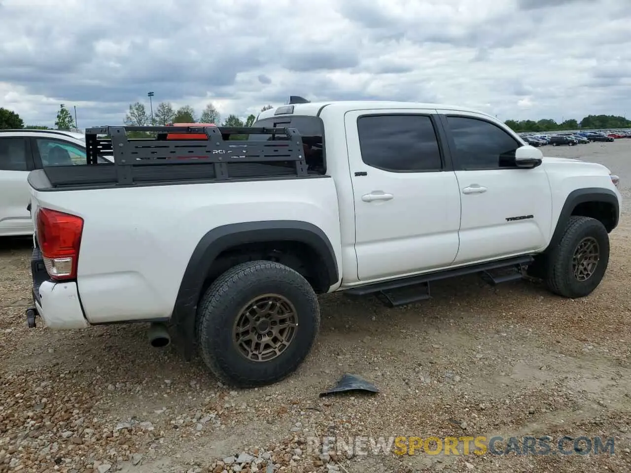 3 Photograph of a damaged car 3TMCZ5AN9PM567230 TOYOTA TACOMA 2023