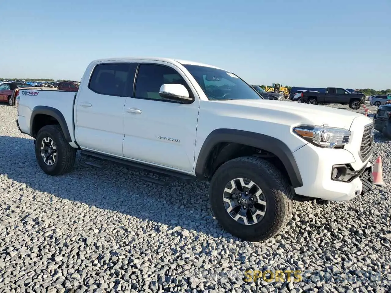 4 Photograph of a damaged car 3TMCZ5AN9PM635848 TOYOTA TACOMA 2023