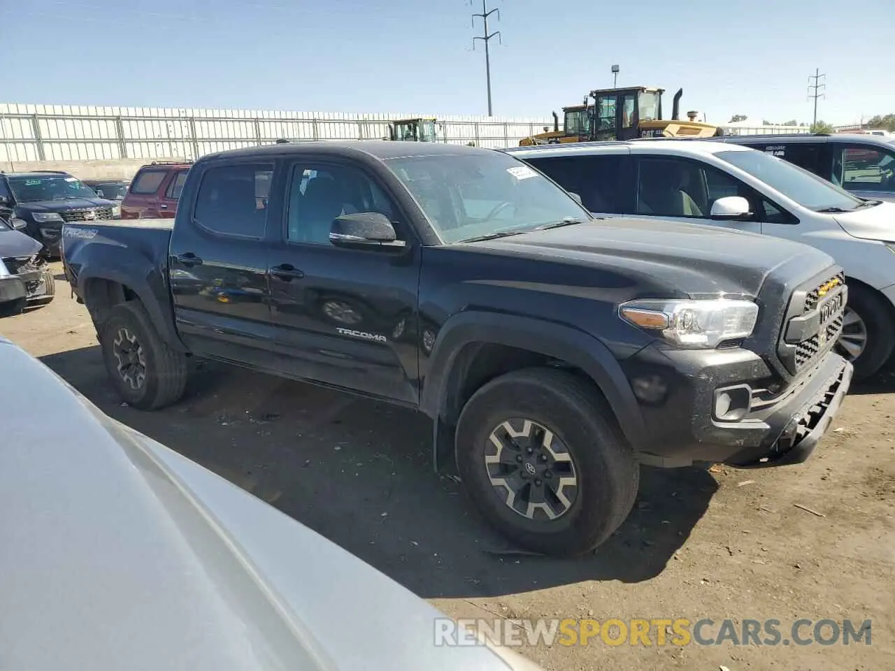 4 Photograph of a damaged car 3TMCZ5AN9PM651693 TOYOTA TACOMA 2023
