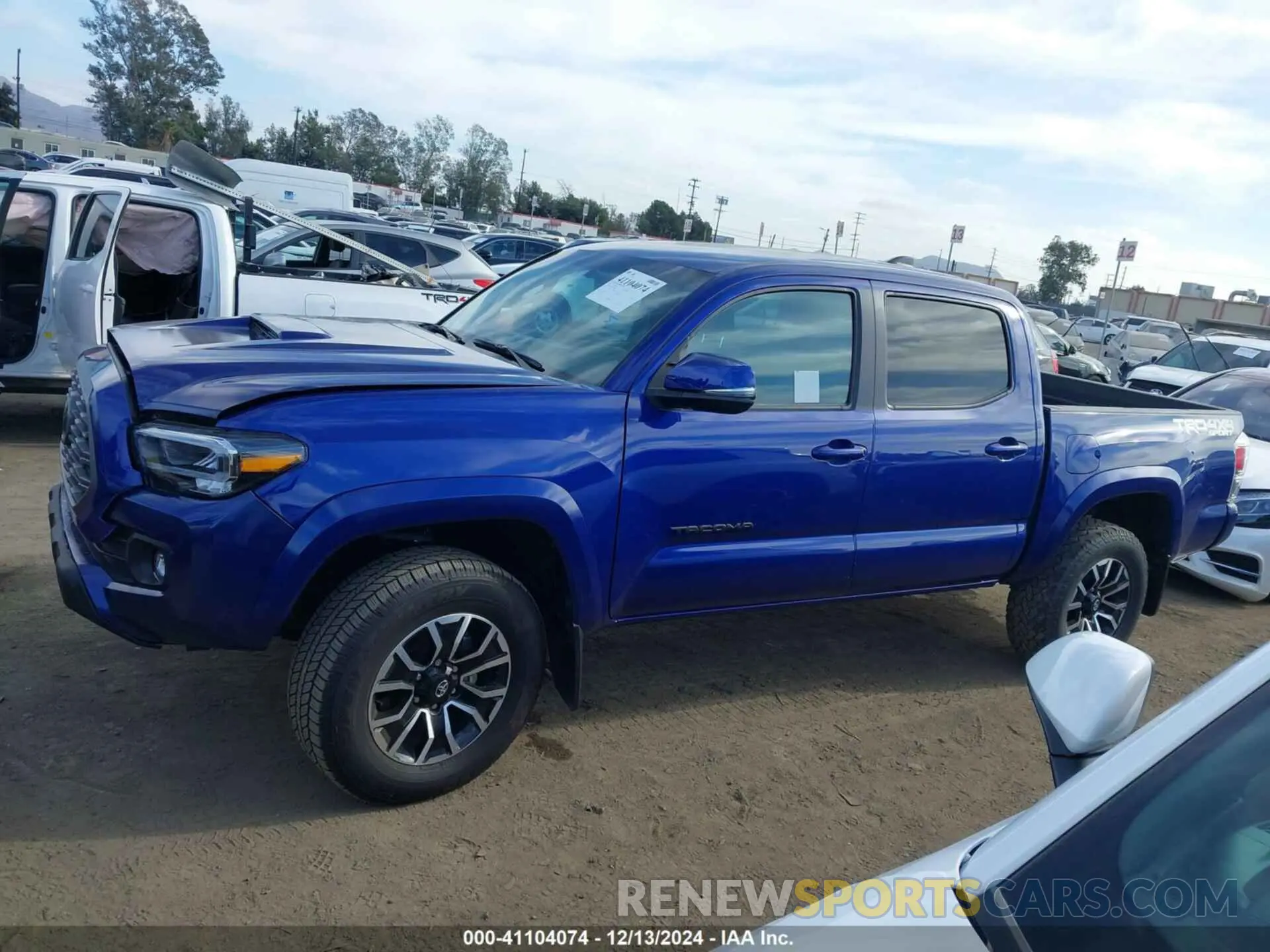 14 Photograph of a damaged car 3TMCZ5ANOPM626004 TOYOTA TACOMA 2023