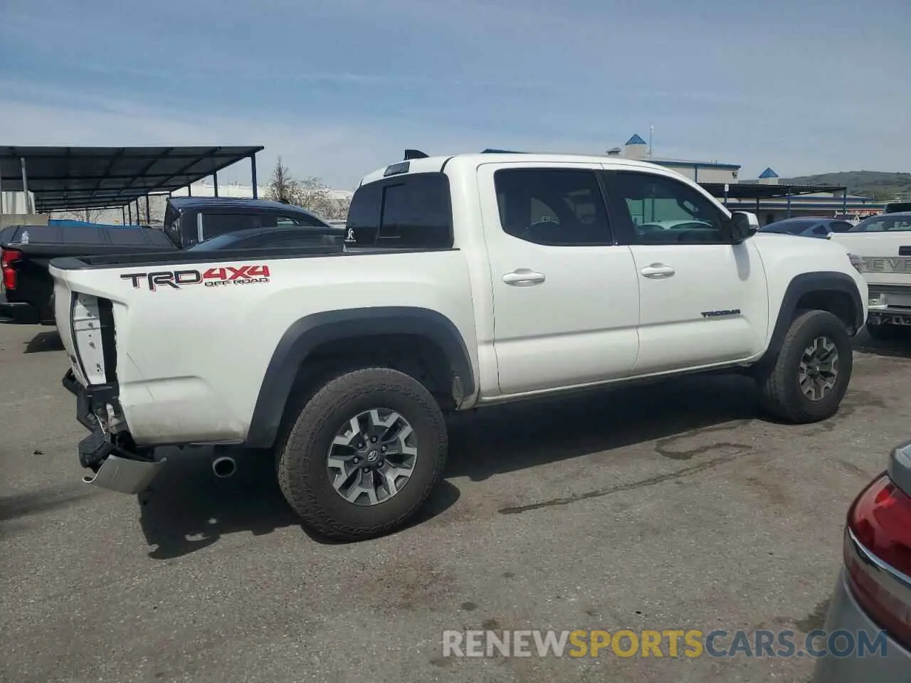 3 Photograph of a damaged car 3TMCZ5ANXPM613129 TOYOTA TACOMA 2023