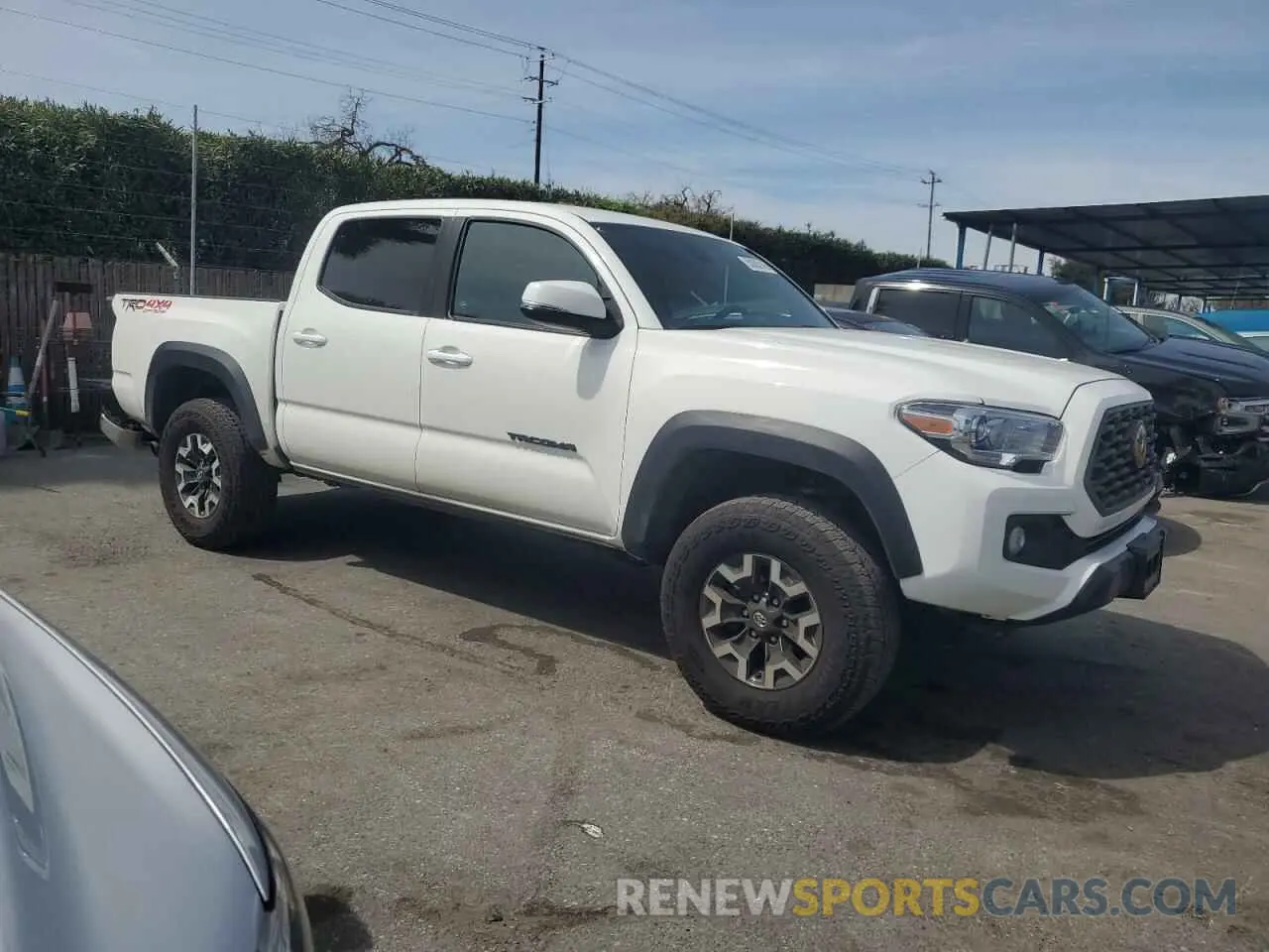 4 Photograph of a damaged car 3TMCZ5ANXPM613129 TOYOTA TACOMA 2023