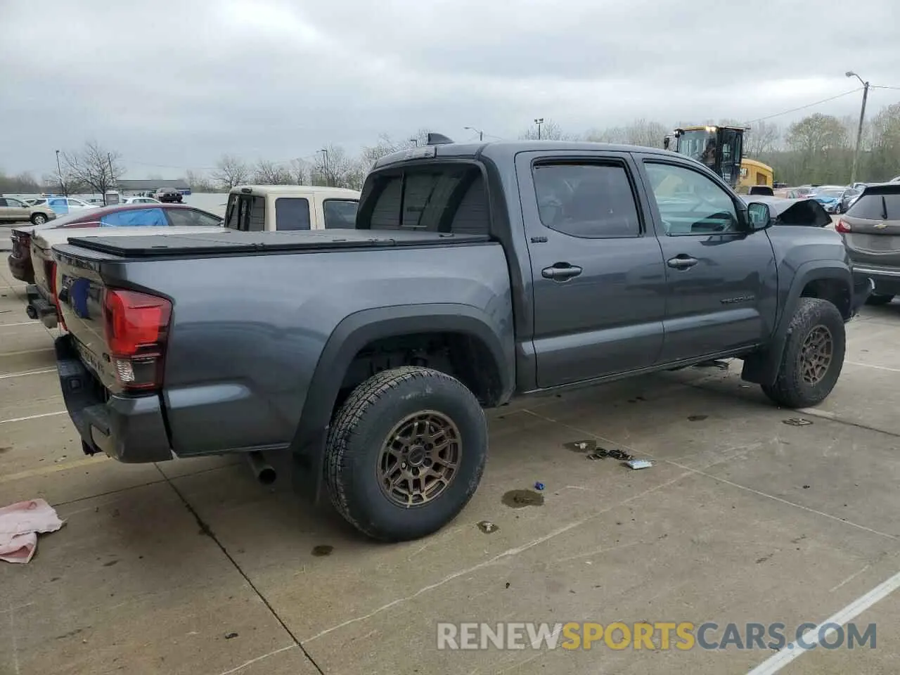 3 Photograph of a damaged car 3TMCZ5ANXPM622221 TOYOTA TACOMA 2023