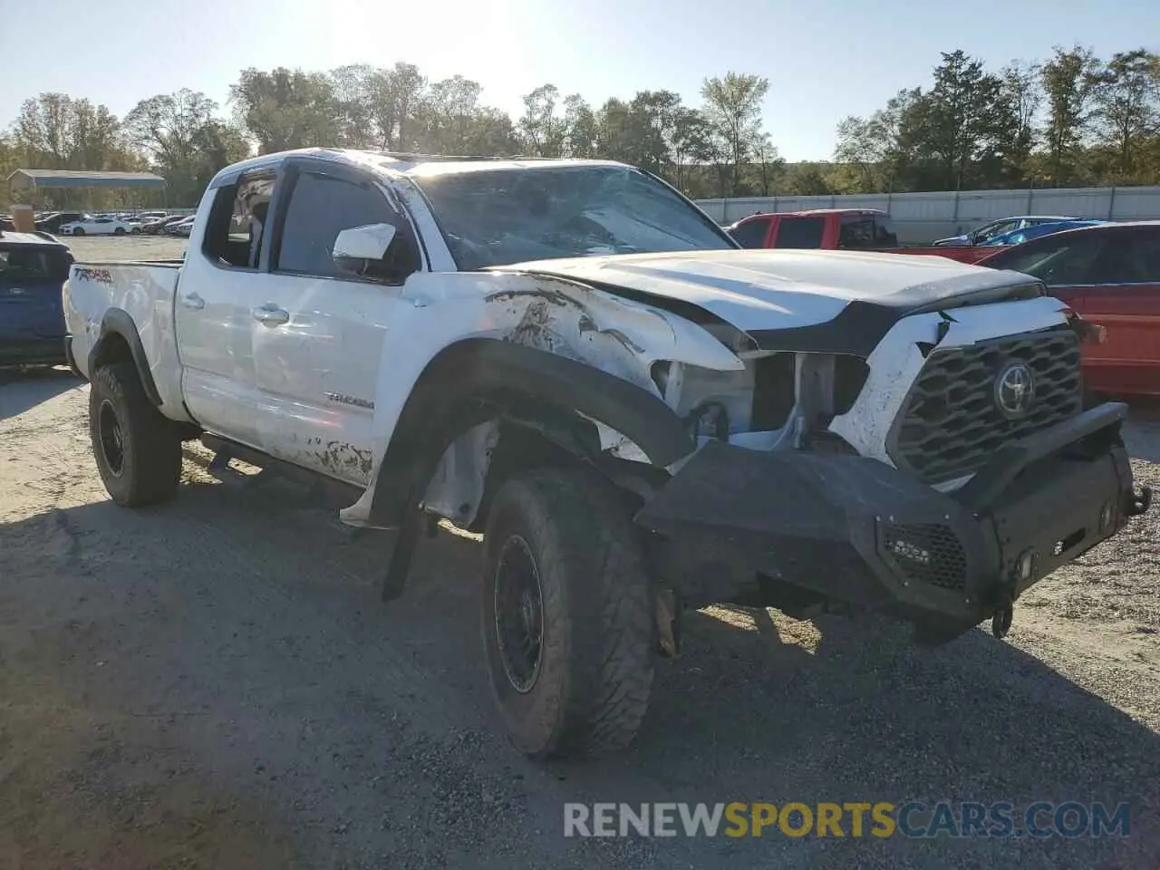 4 Photograph of a damaged car 3TMDZ5BN0PM165289 TOYOTA TACOMA 2023