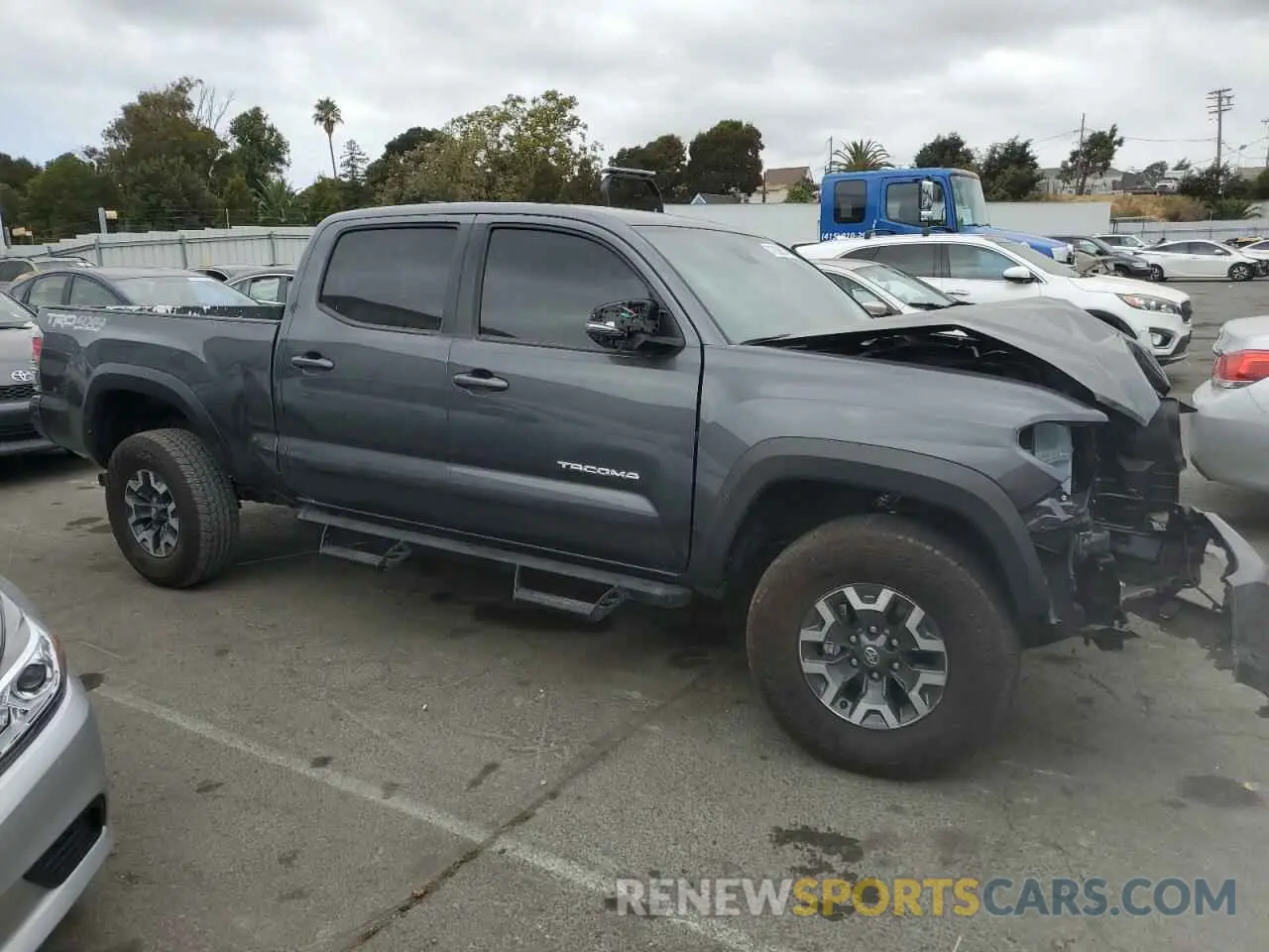 4 Photograph of a damaged car 3TMDZ5BN1PM147299 TOYOTA TACOMA 2023
