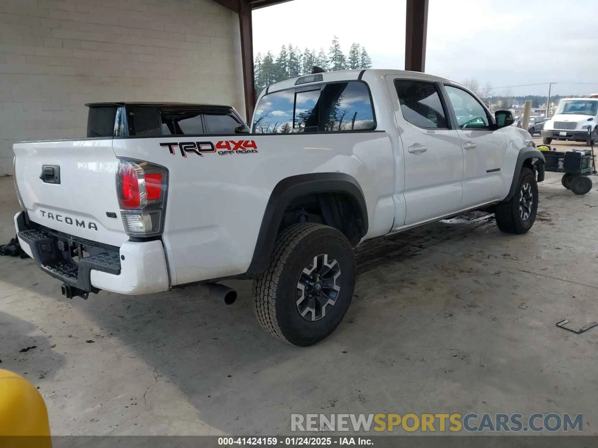 4 Photograph of a damaged car 3TMDZ5BN1PM158884 TOYOTA TACOMA 2023