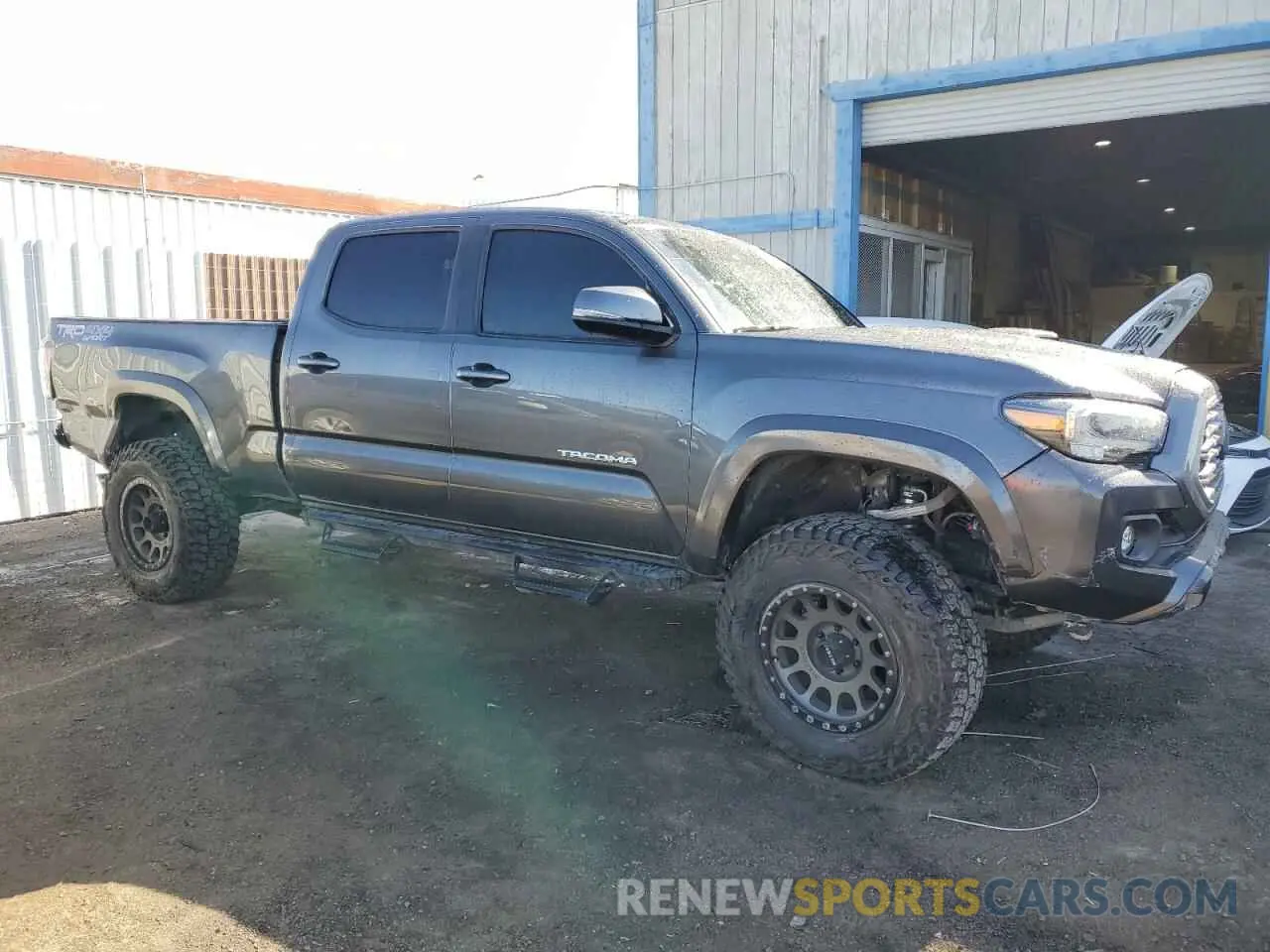 4 Photograph of a damaged car 3TMDZ5BN6PM143474 TOYOTA TACOMA 2023